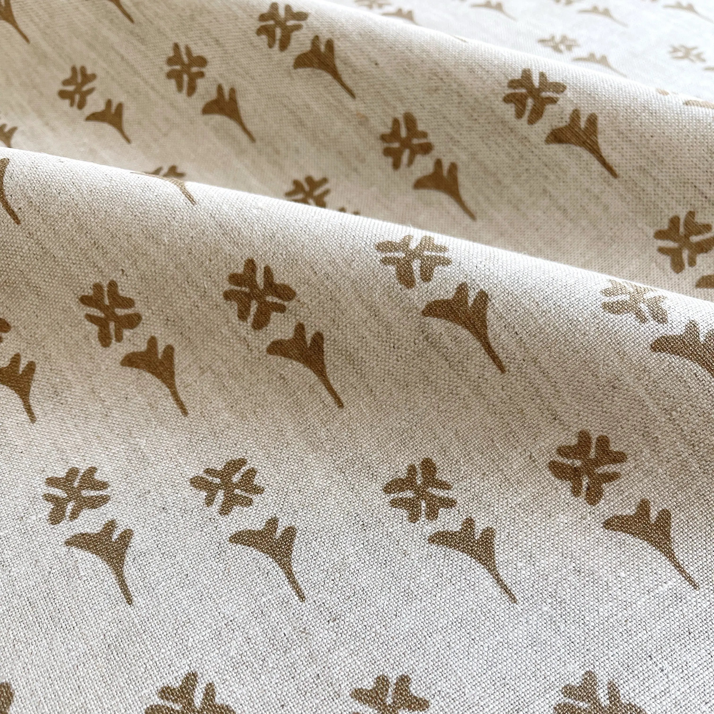 Daffodil fabric in Copper by Emily Daws — close-up detail of Belgian linen, Flora Collection