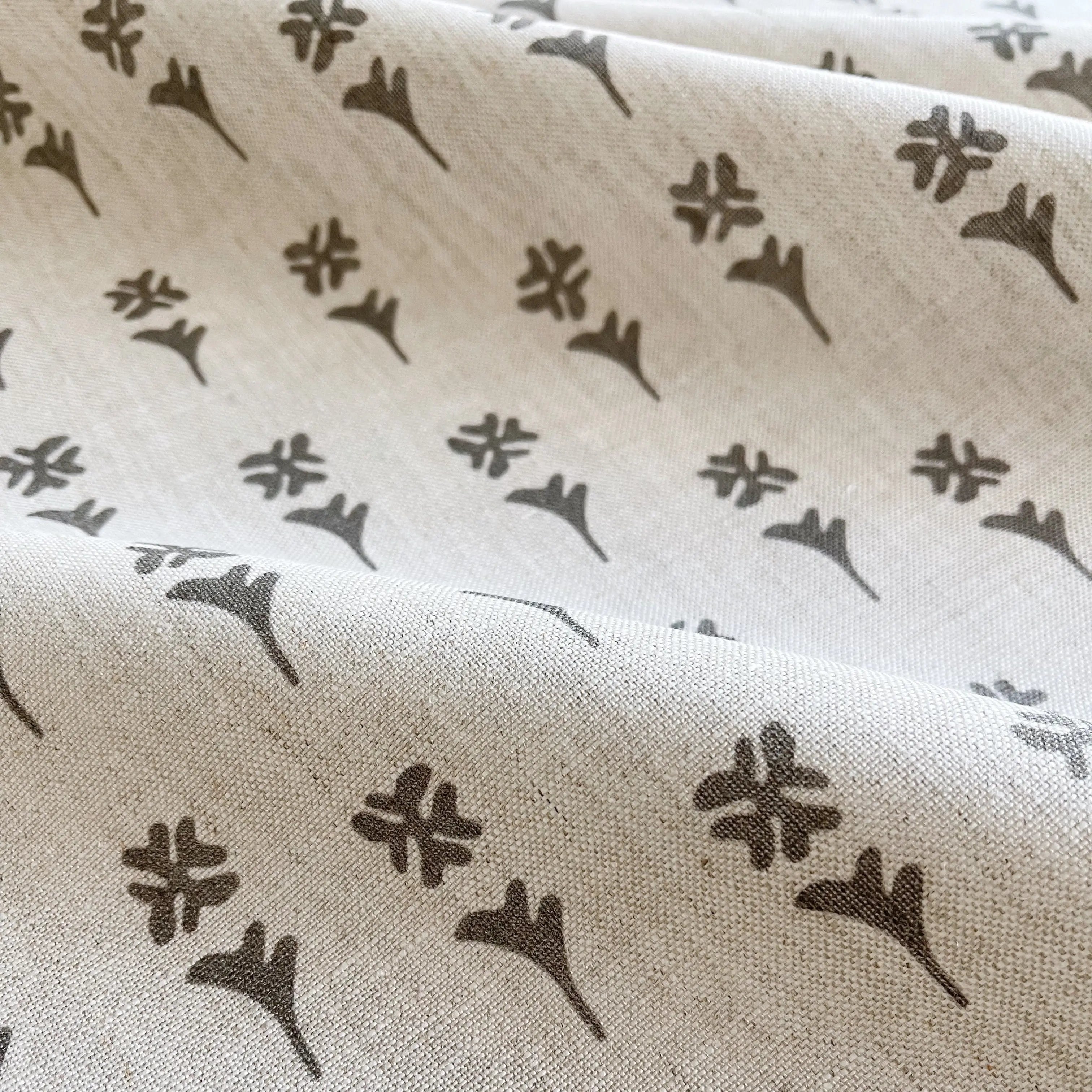 Daffodil fabric in Dusk by Emily Daws — close-up detail of Belgian linen, Flora Collection