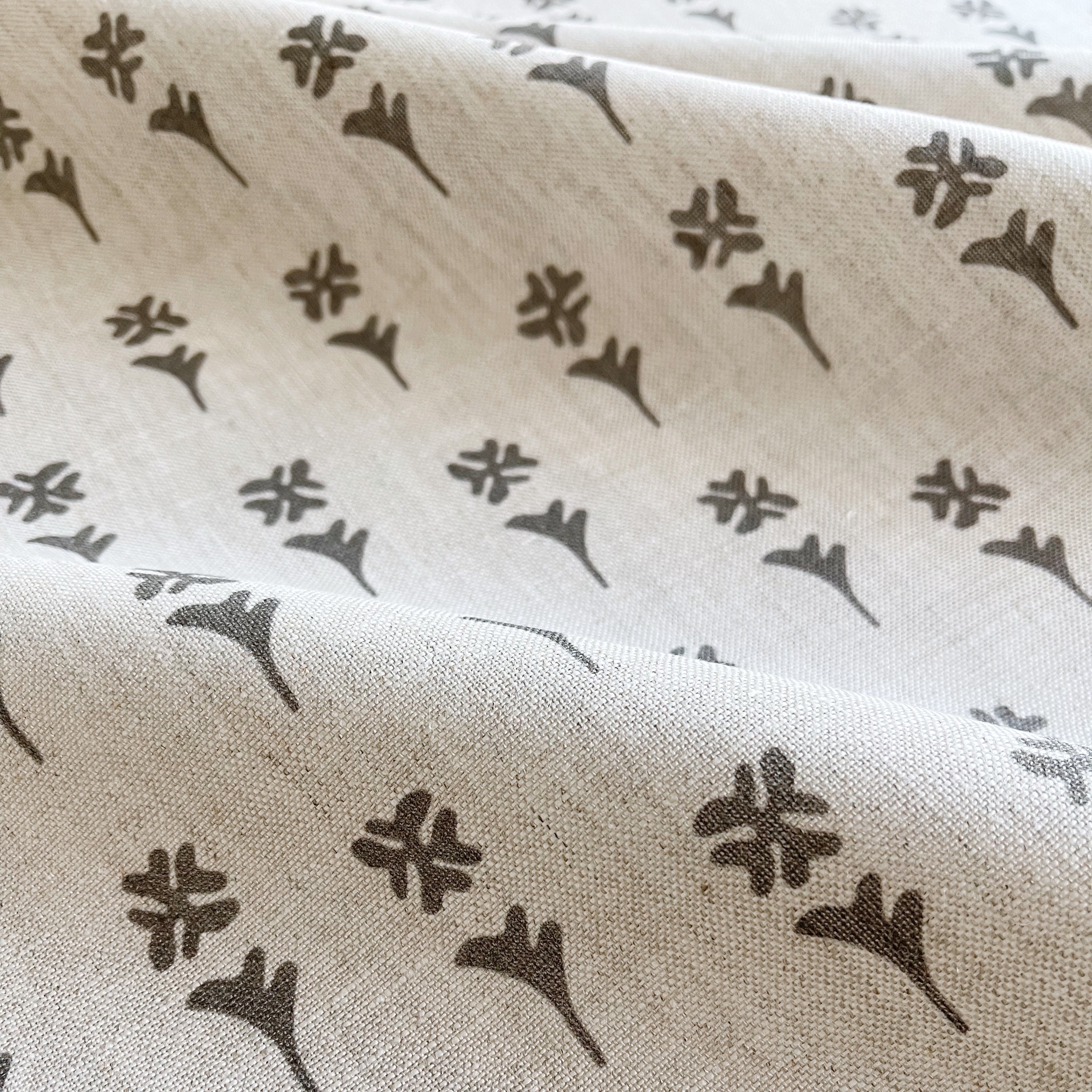 Daffodil pillow in Dusk – fabric detail showing botanical print and linen texture from Flora Collection
