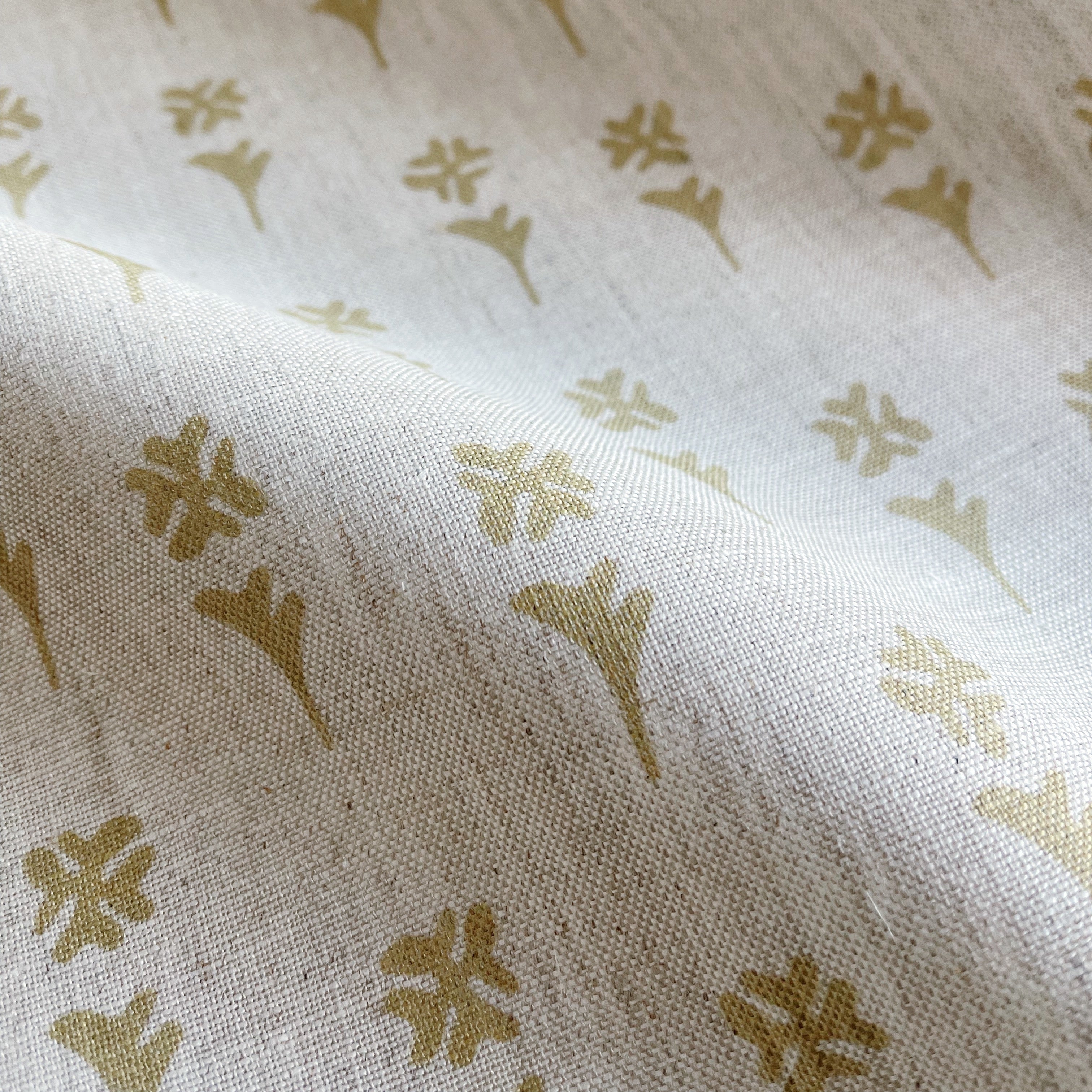 Daffodil pillow in Tupelo – fabric detail showing botanical print and linen texture from Flora Collection