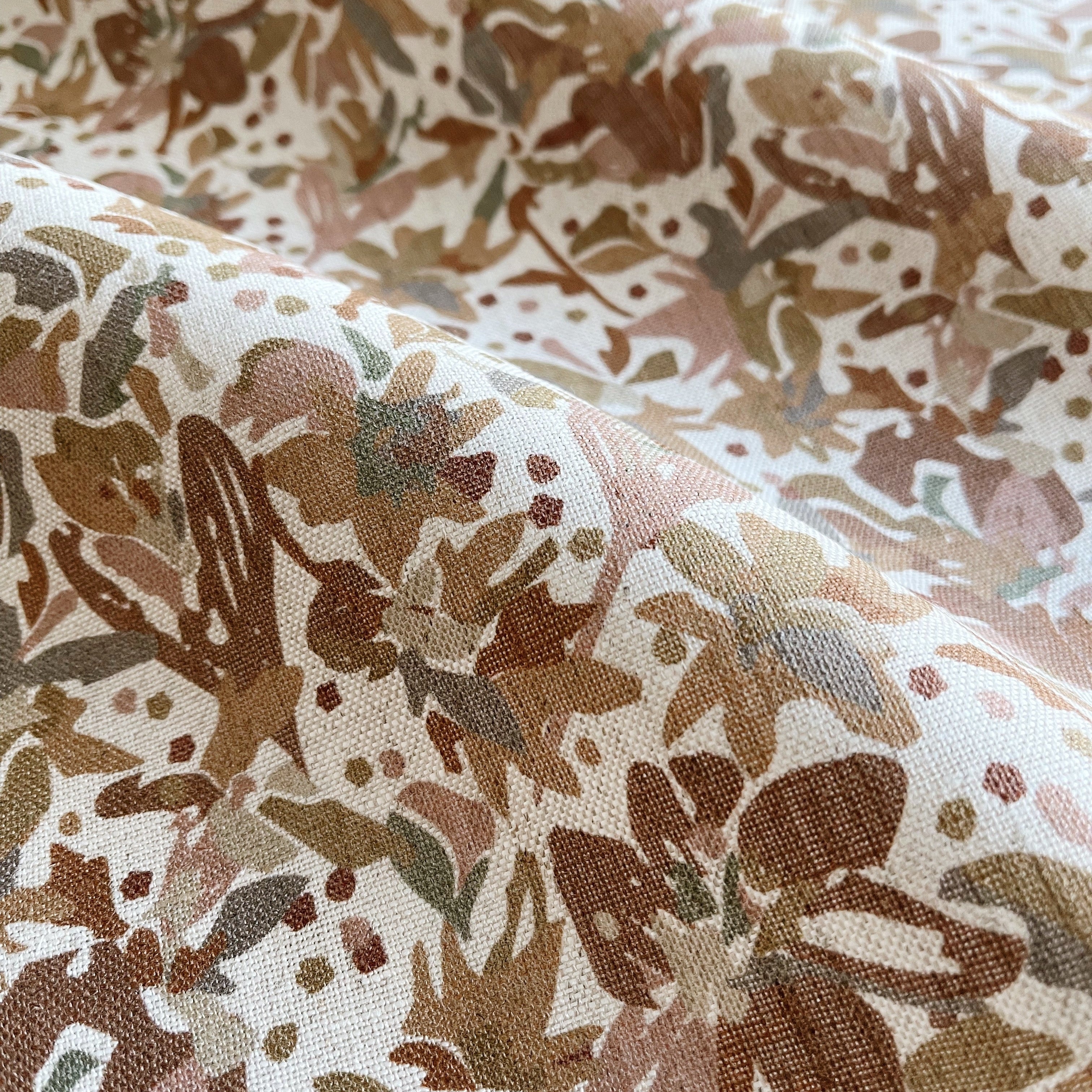 Eden fabric in Autumn β close-up of linen texture and leafy pattern; perfect for pattern sofas