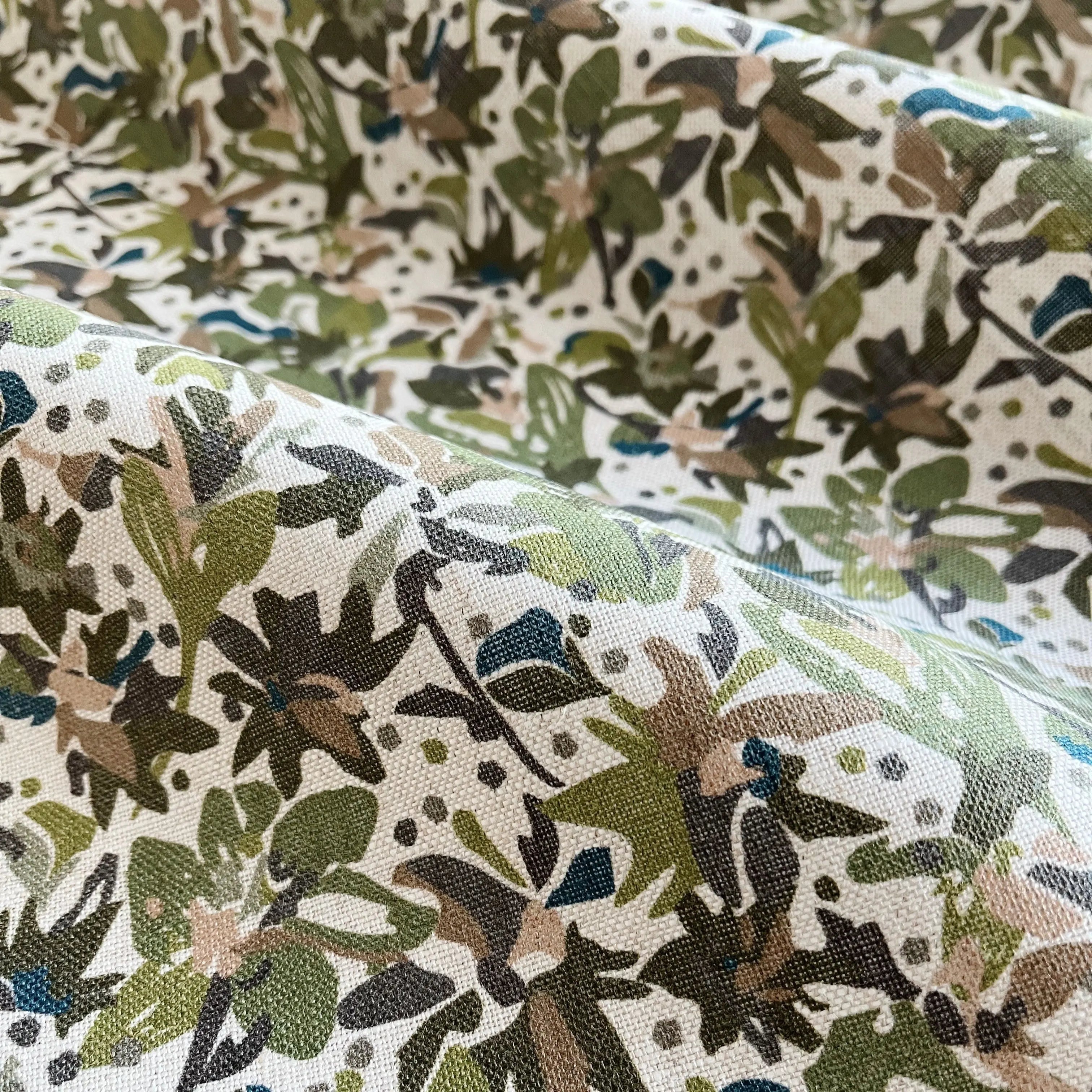 Eden Olive pillow by Emily Daws styled in an interior β Flora Collection