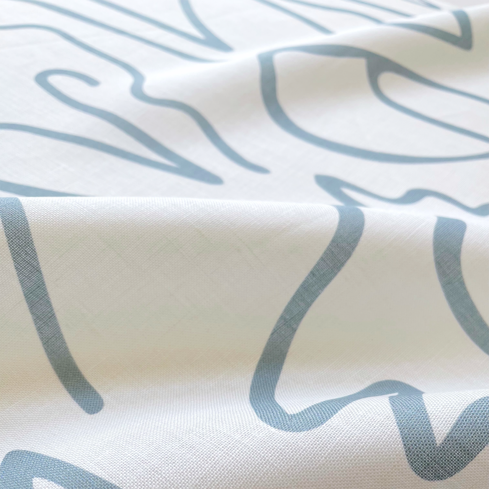 Edisto fabric in Turquoise by Emily Daws — close-up detail of Belgian linen, Sea Island Collection