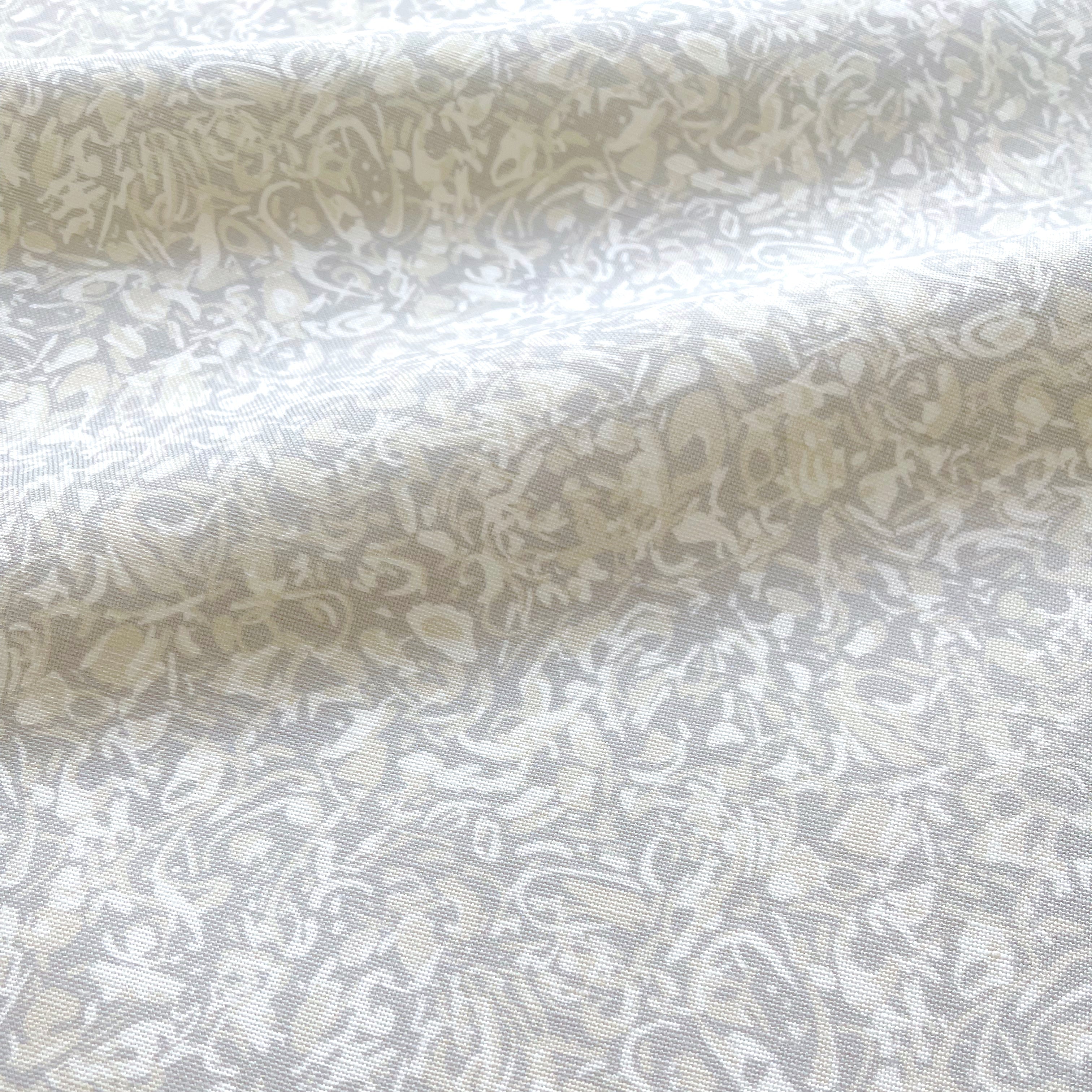 Estuary pillow in Drift – close-up of fabric texture and linear pattern from the Waterways Collection