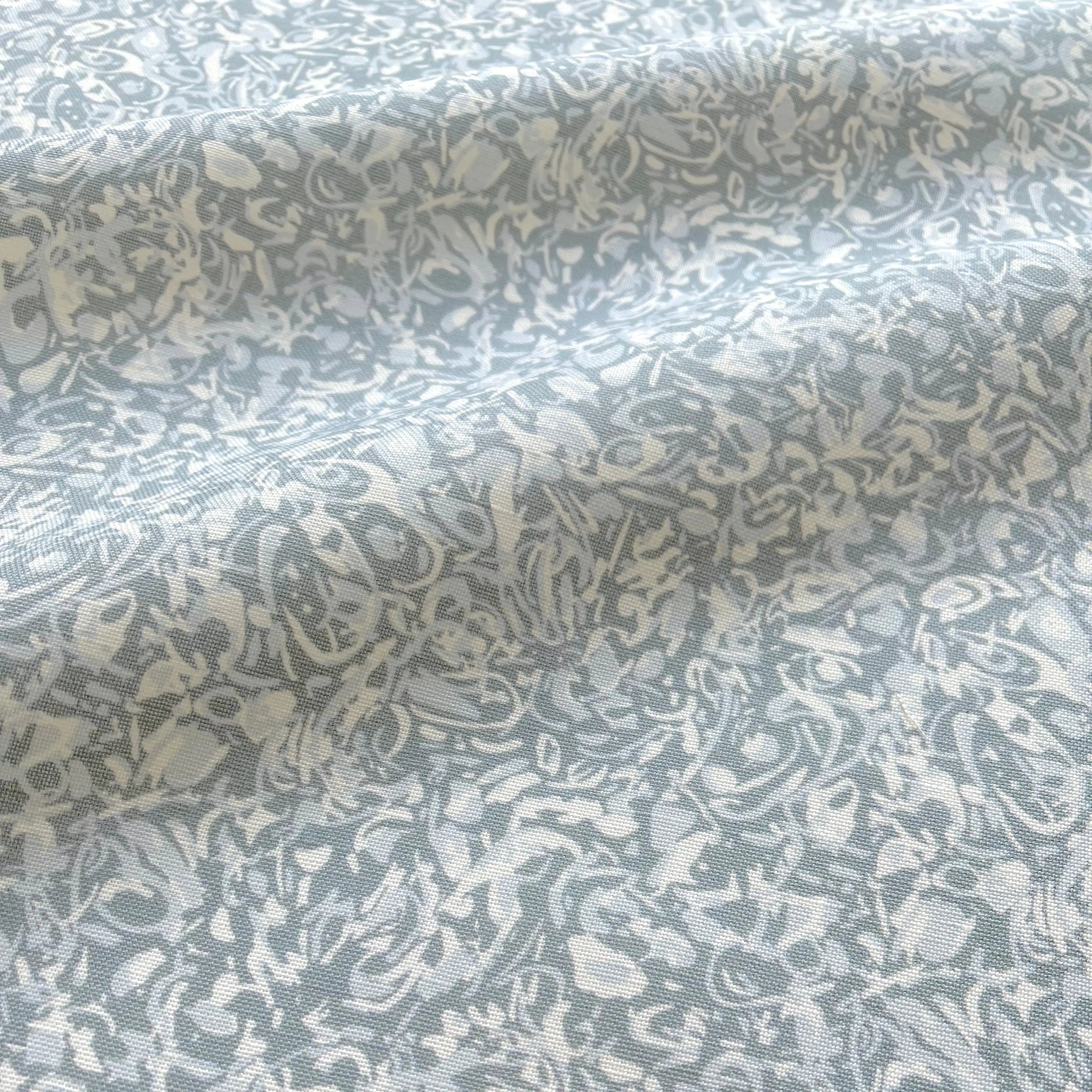 Estuary fabric in Heron by Emily Daws — close-up detail of Belgian linen, Waterways Collection