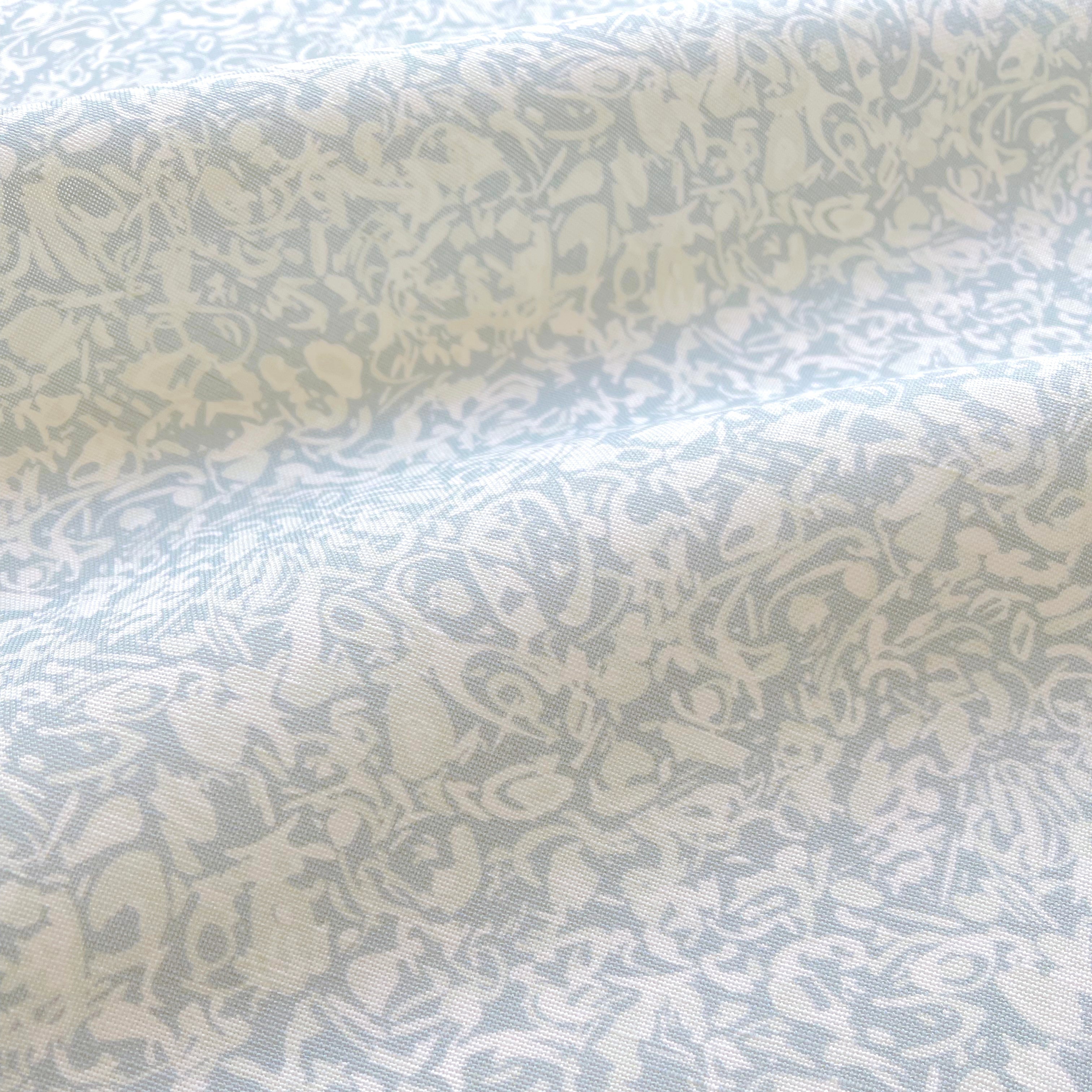 Estuary pillow in Moon – close-up of fabric texture and linear pattern from the Waterways Collection