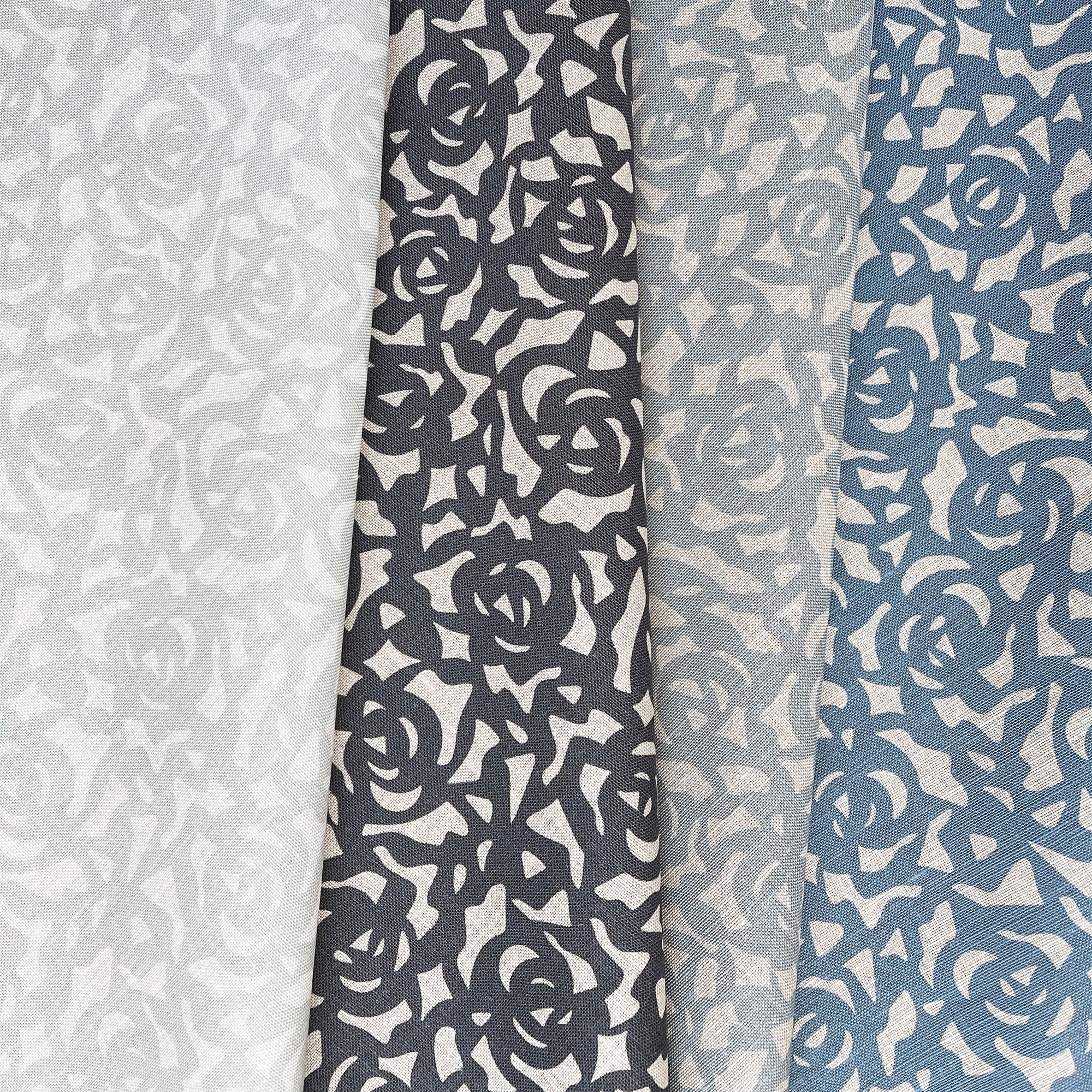 Gardenia fabric in Indigo by Emily Daws – styled in a coastal-inspired interior for pillows or window treatments – Charleston fabric by the yard for interiors