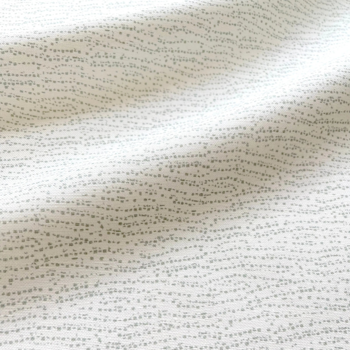 Harbor Celadon pillow by Emily Daws styled in an interior — Waterways Collection