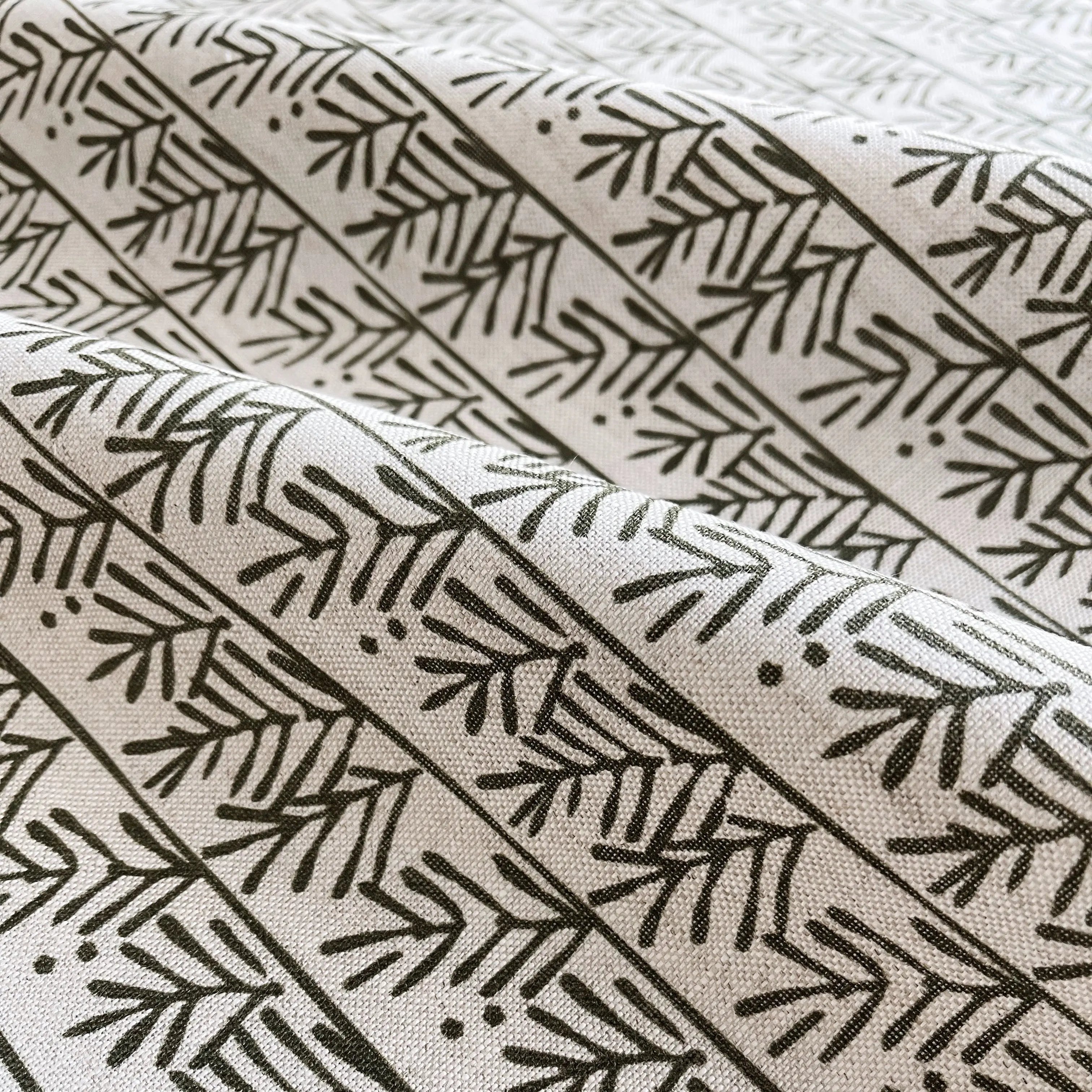 Hemlock fabric in Holly by Emily Daws — close-up detail of Belgian linen, Flora Collection
