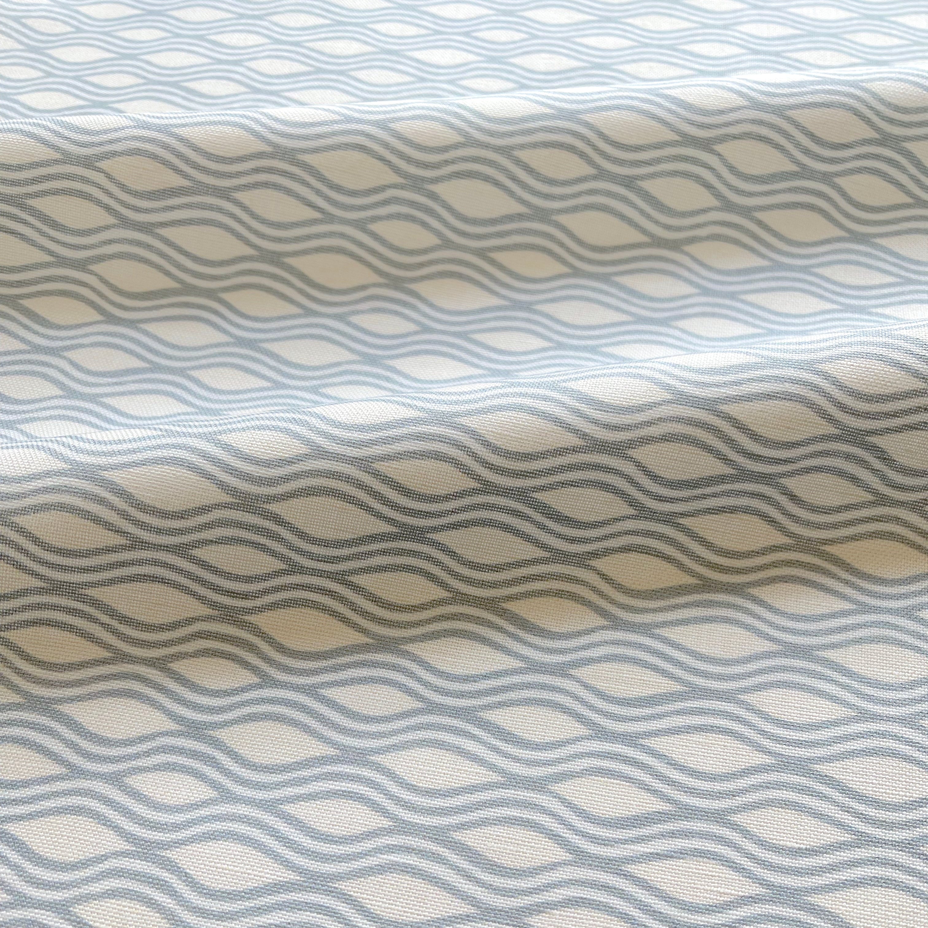 Inlet pillow in Cloud – close-up of fabric texture and linear pattern from the Waterways Collection