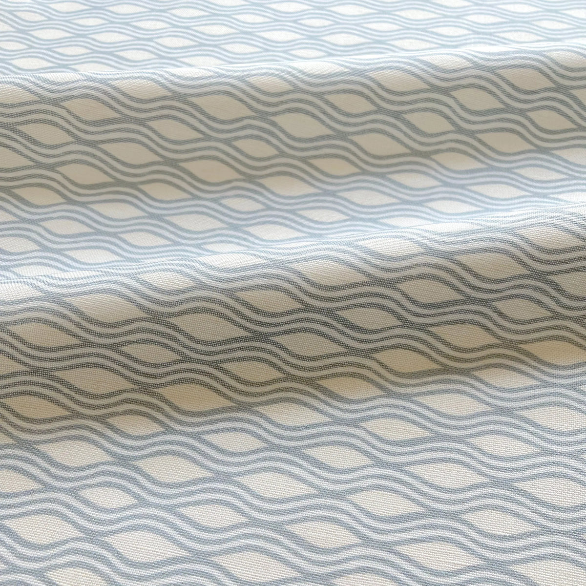 Inlet Cloud pillow by Emily Daws styled in an interior — Waterways Collection