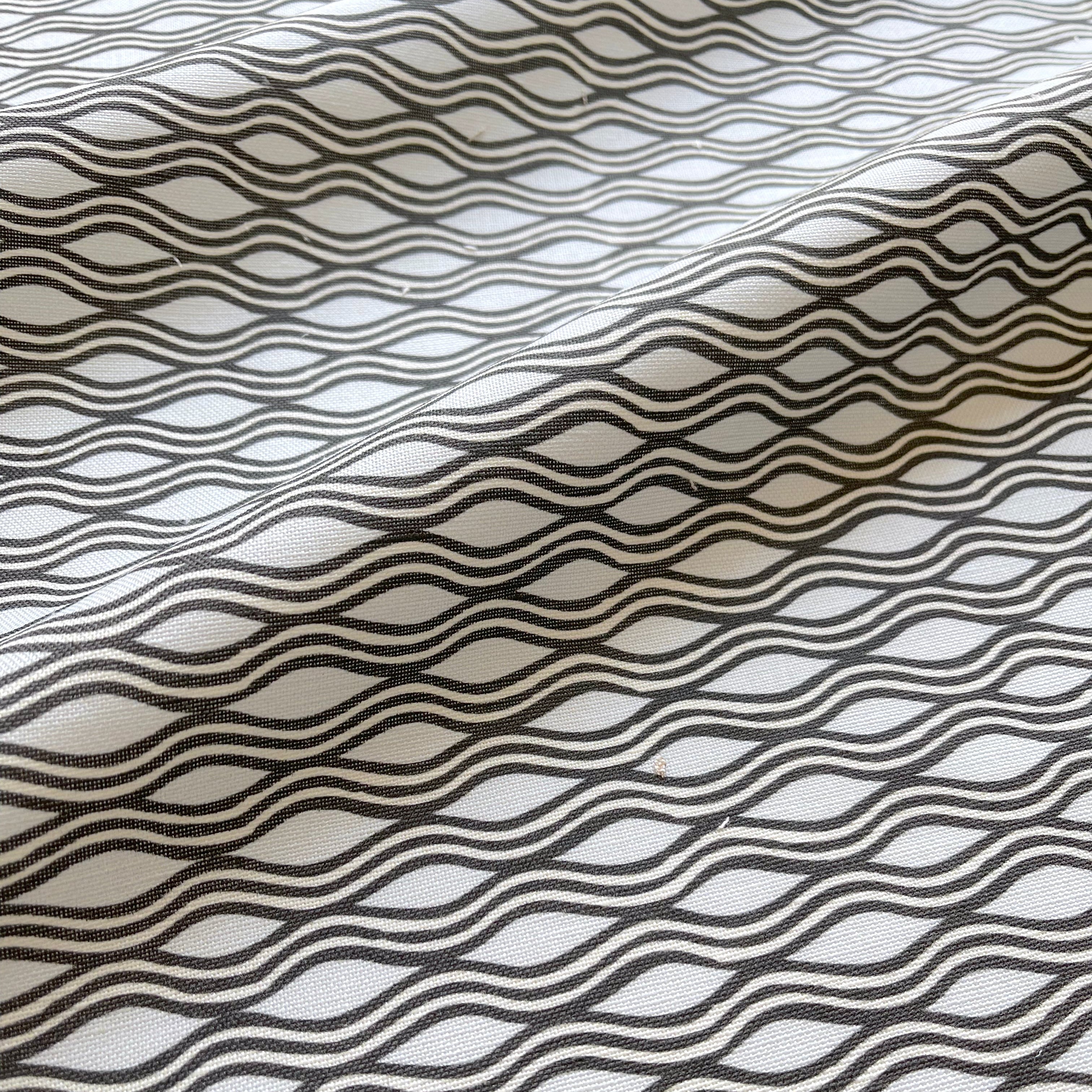 Inlet pillow in Shadow β close-up of fabric texture and linear pattern from the Waterways Collection