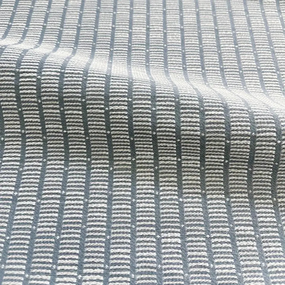 Jetty fabric in Cooper Blue by Emily Daws — close-up detail of woven upholstery fabric, Waterways Collection