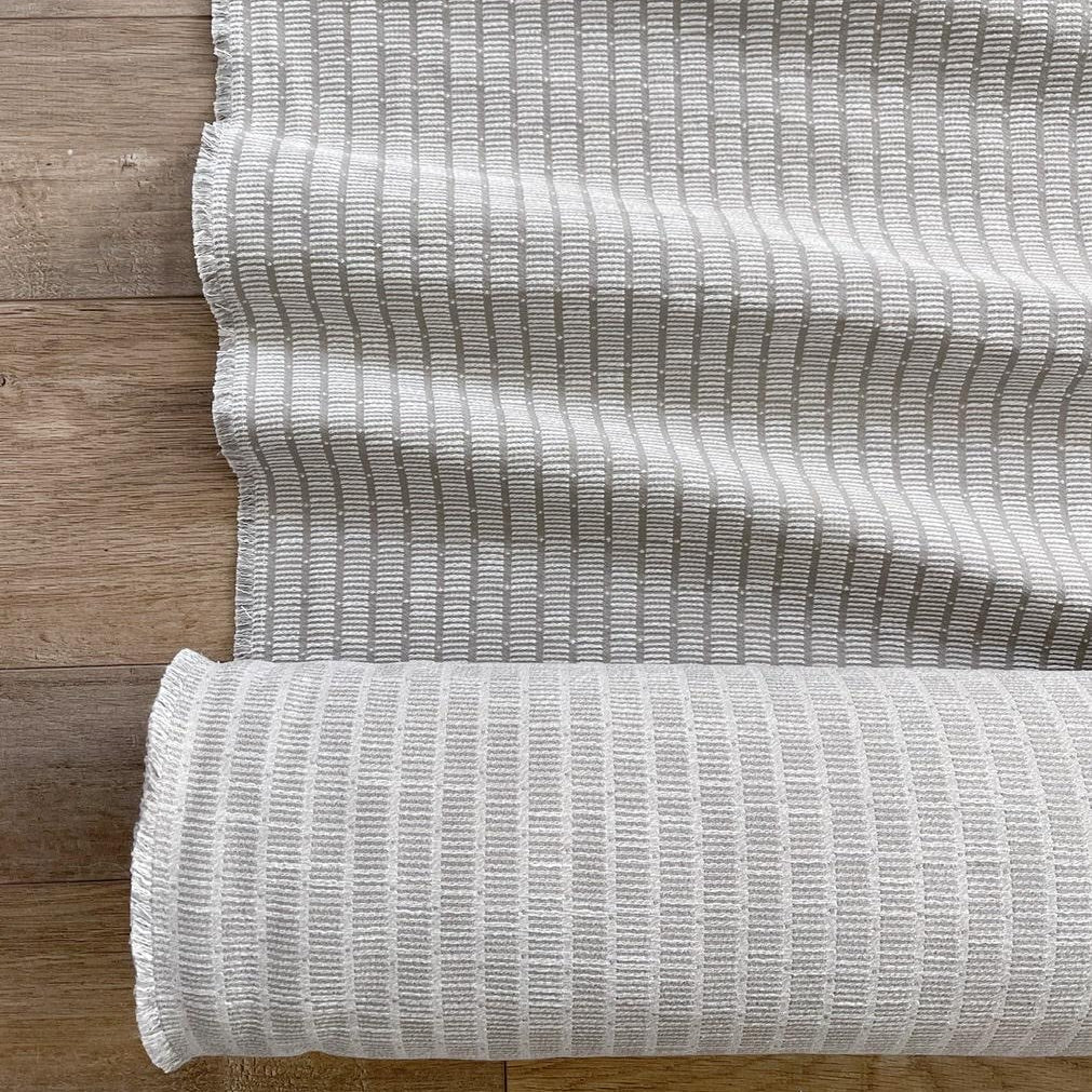 Jetty fabric in Dolphin by Emily Daws β styled in a Charleston coastal home; perfect for pillows, window treatments, or accent upholstery β Waterways fabric collection; Charleston luxury fabric by the yard for interiors and coastal homes