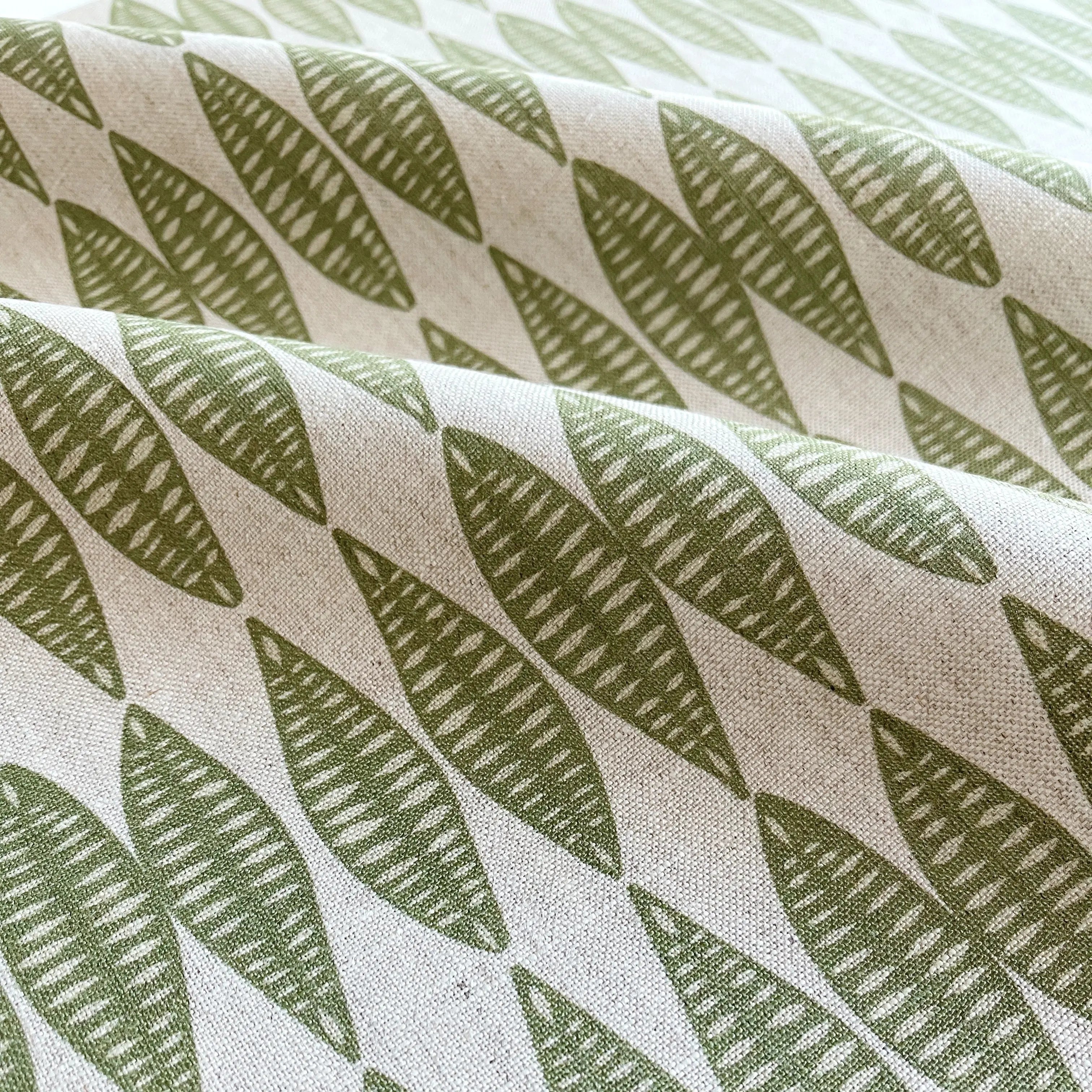 Leaflette fabric in Peridot by Emily Daws — close-up detail of Belgian linen, Flora Collection
