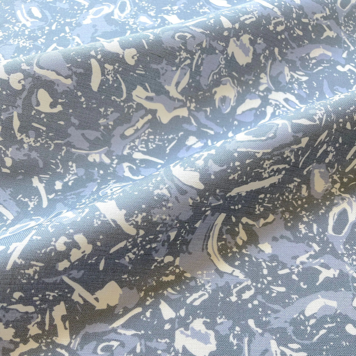 River Reef Royal pillow by Emily Daws styled in an interior — Waterways Collection