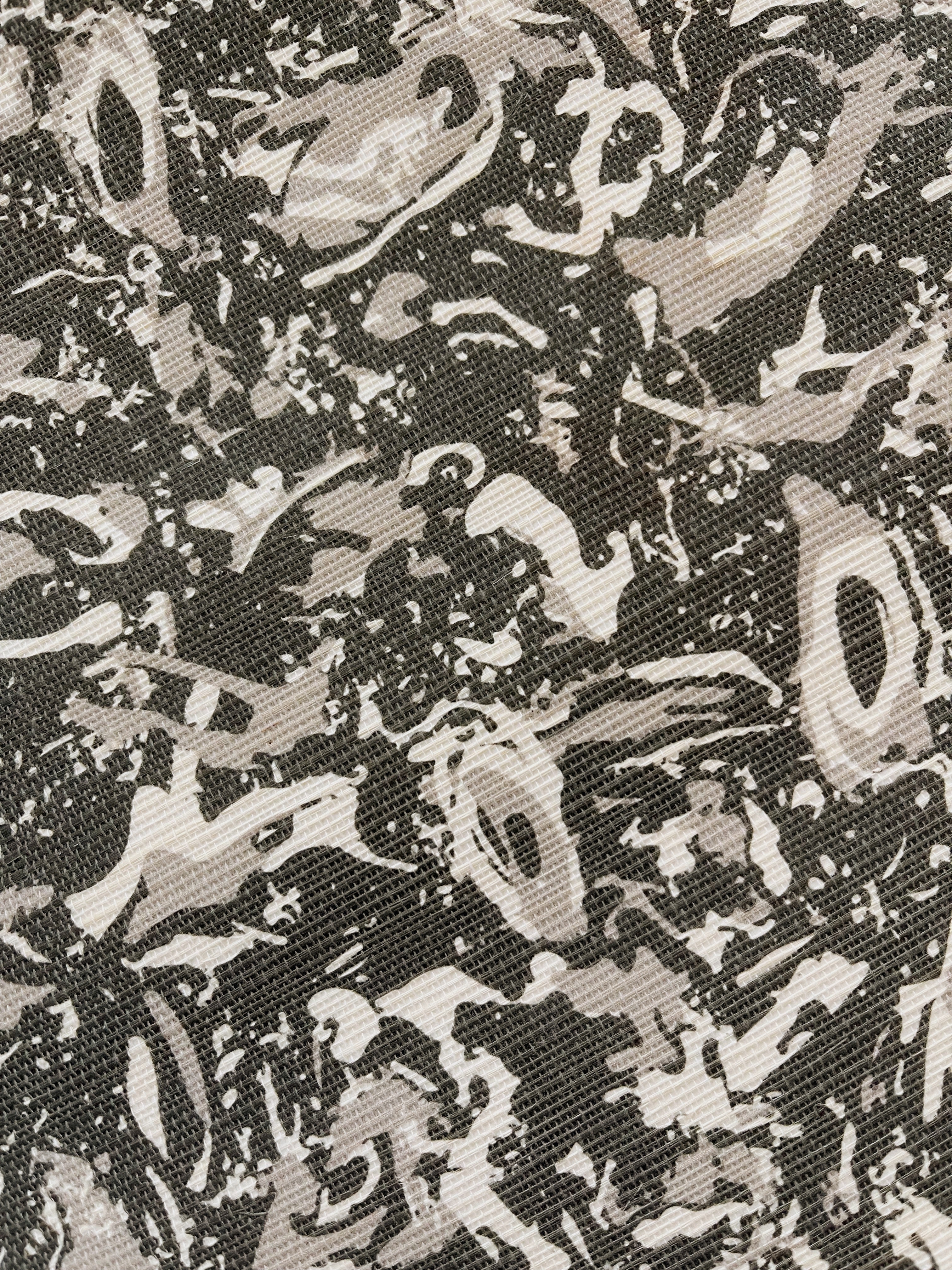 River Reef wallpaper in Coal – close-up showing texture and tone of design
