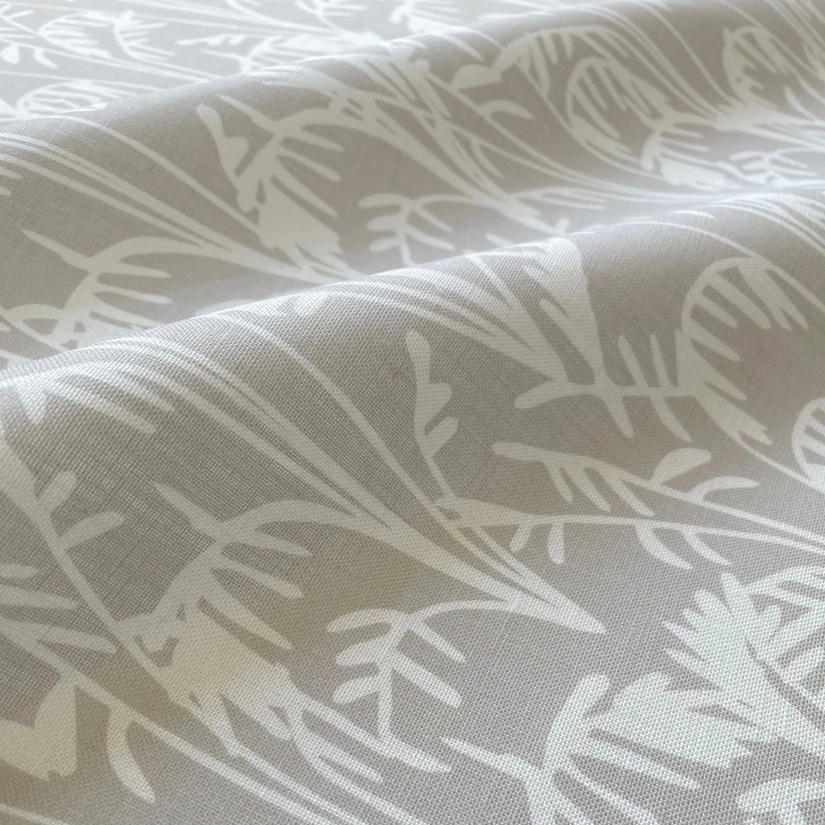 Seabrook Ii Sand pillow by Emily Daws styled in an interior — Sea Island Collection