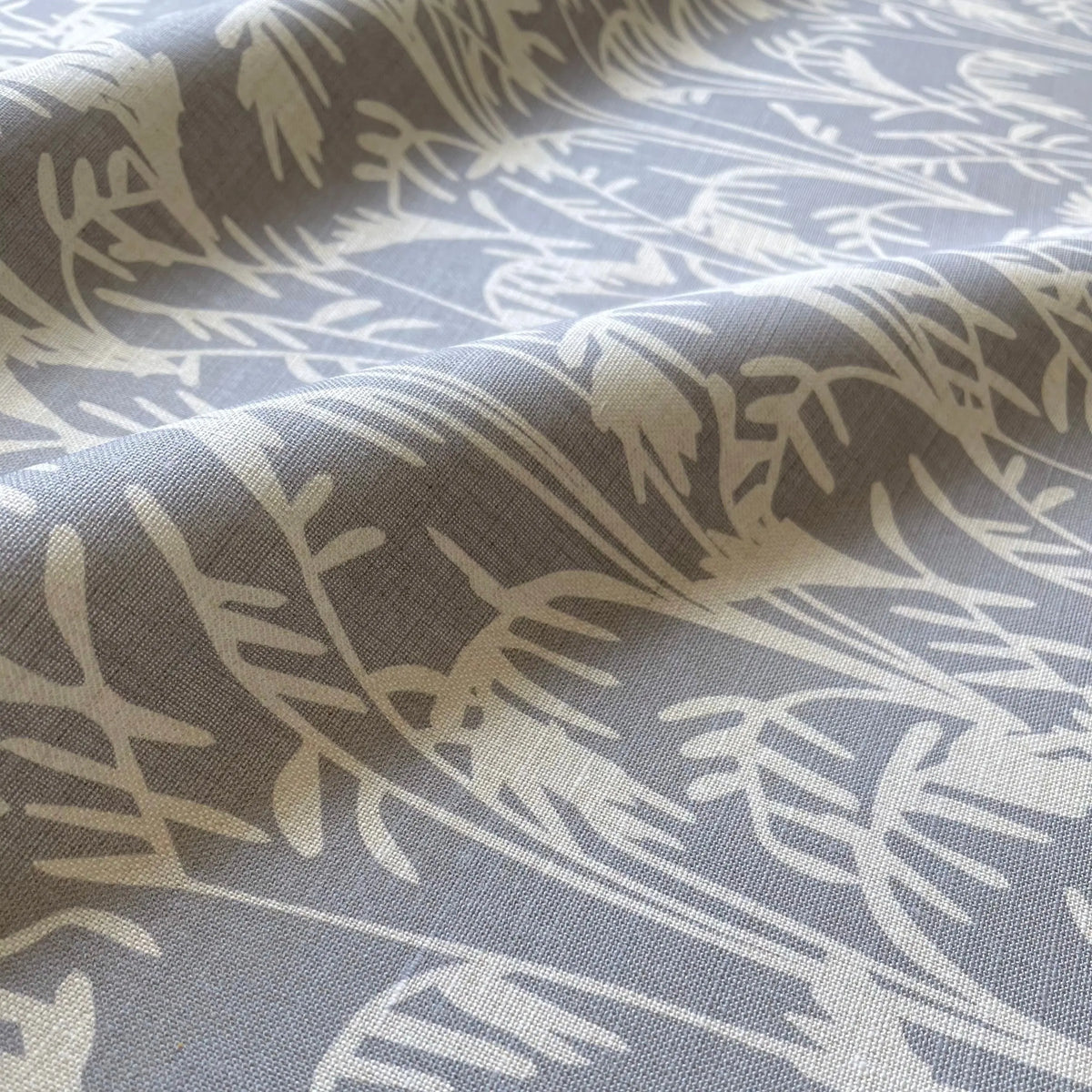 Seabrook Ii Twilight pillow by Emily Daws styled in an interior — Sea Island Collection