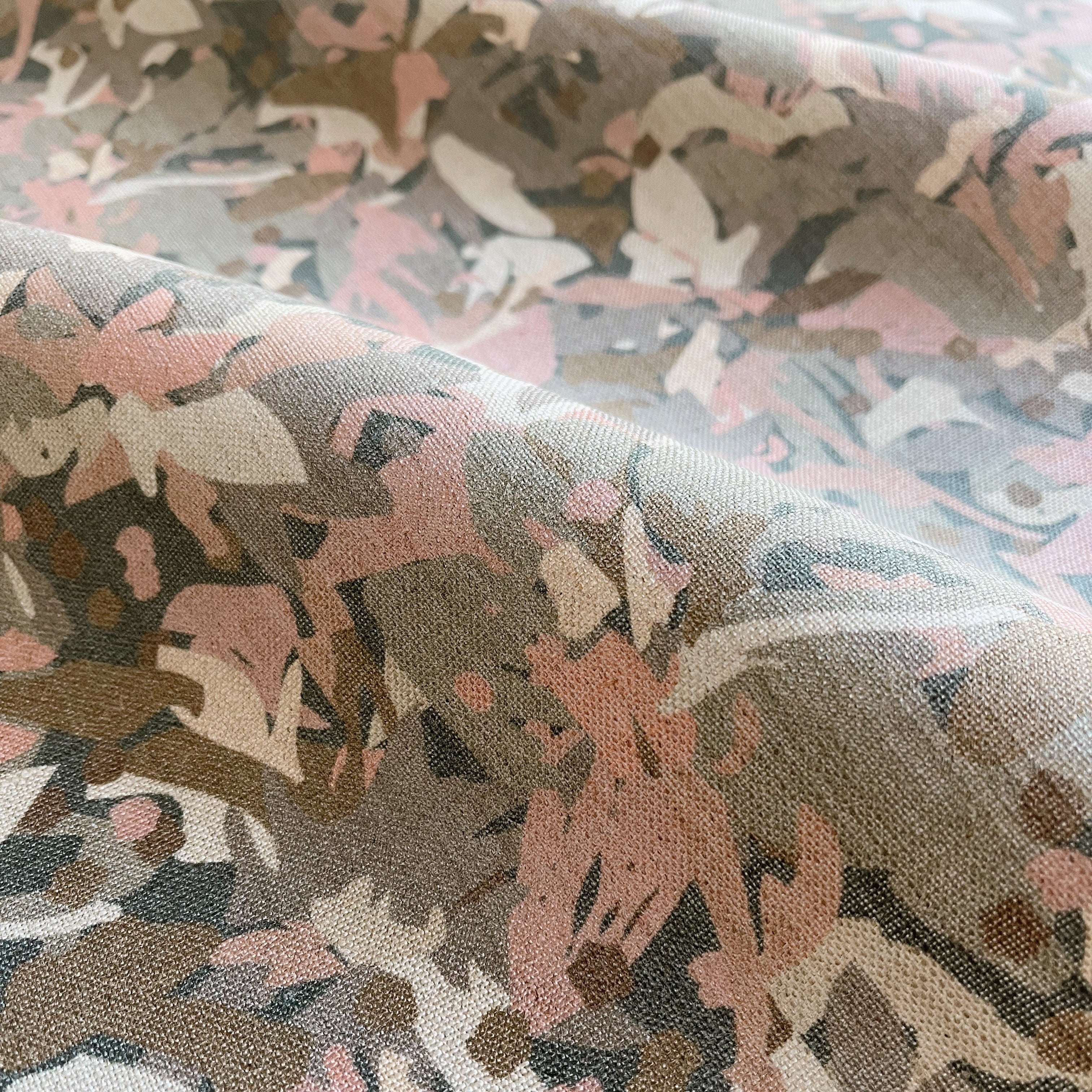 Thicket pillow in Rouge β fabric detail showing botanical print and linen texture from Flora Collection