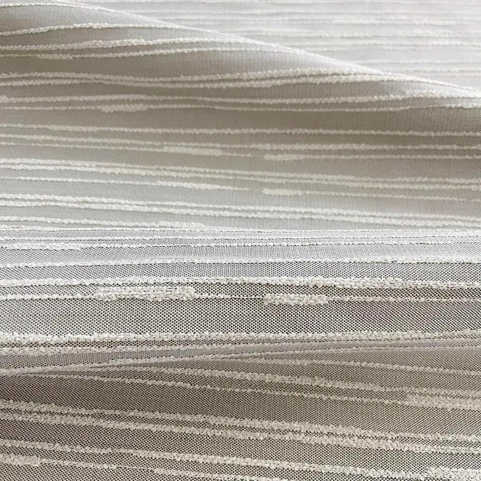 Washout fabric in Pebble by Emily Daws — close-up detail of woven upholstery fabric, Waterways Collection