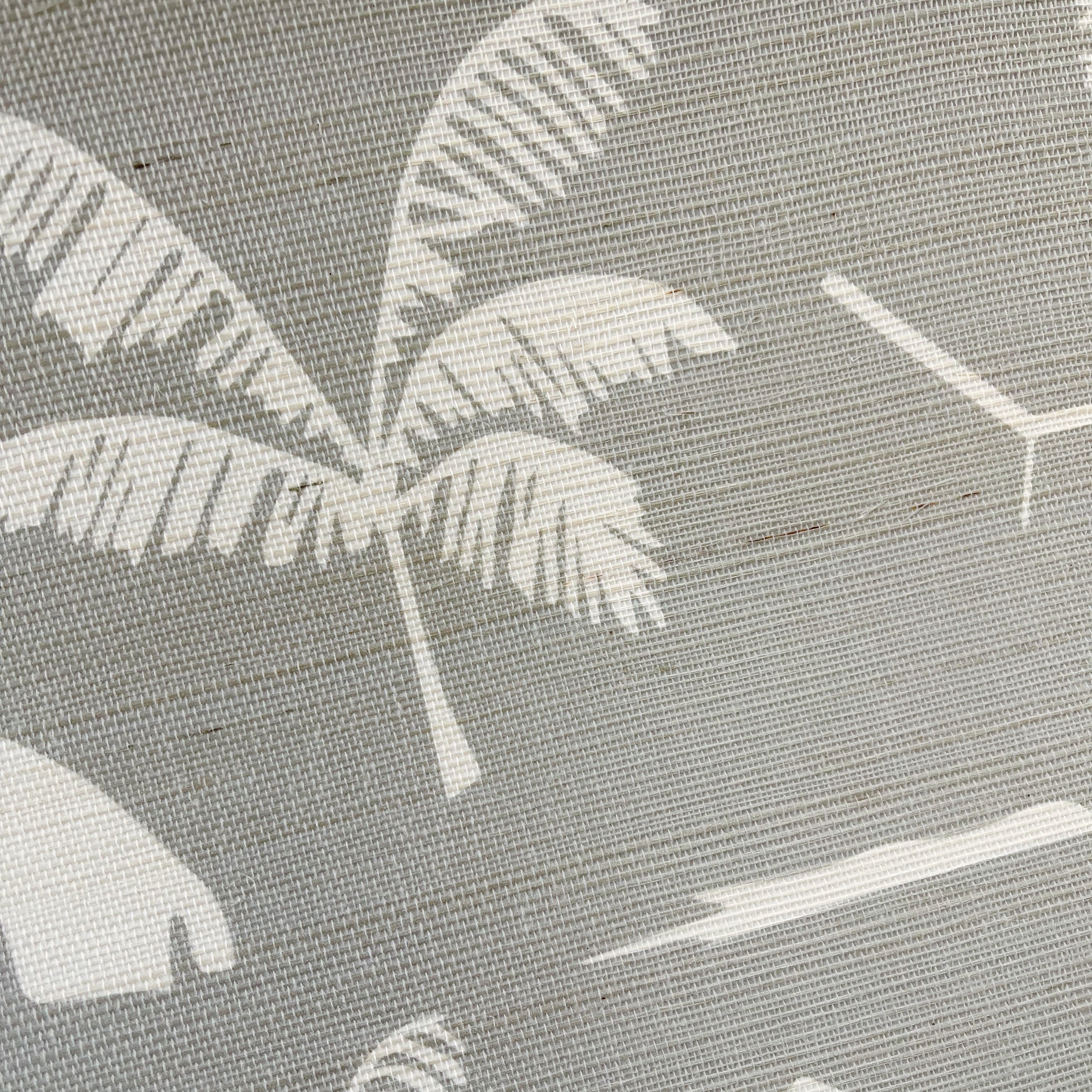 Folly Toile Grasscloth wallpaper in Harbor β close-up showing texture and tone of design