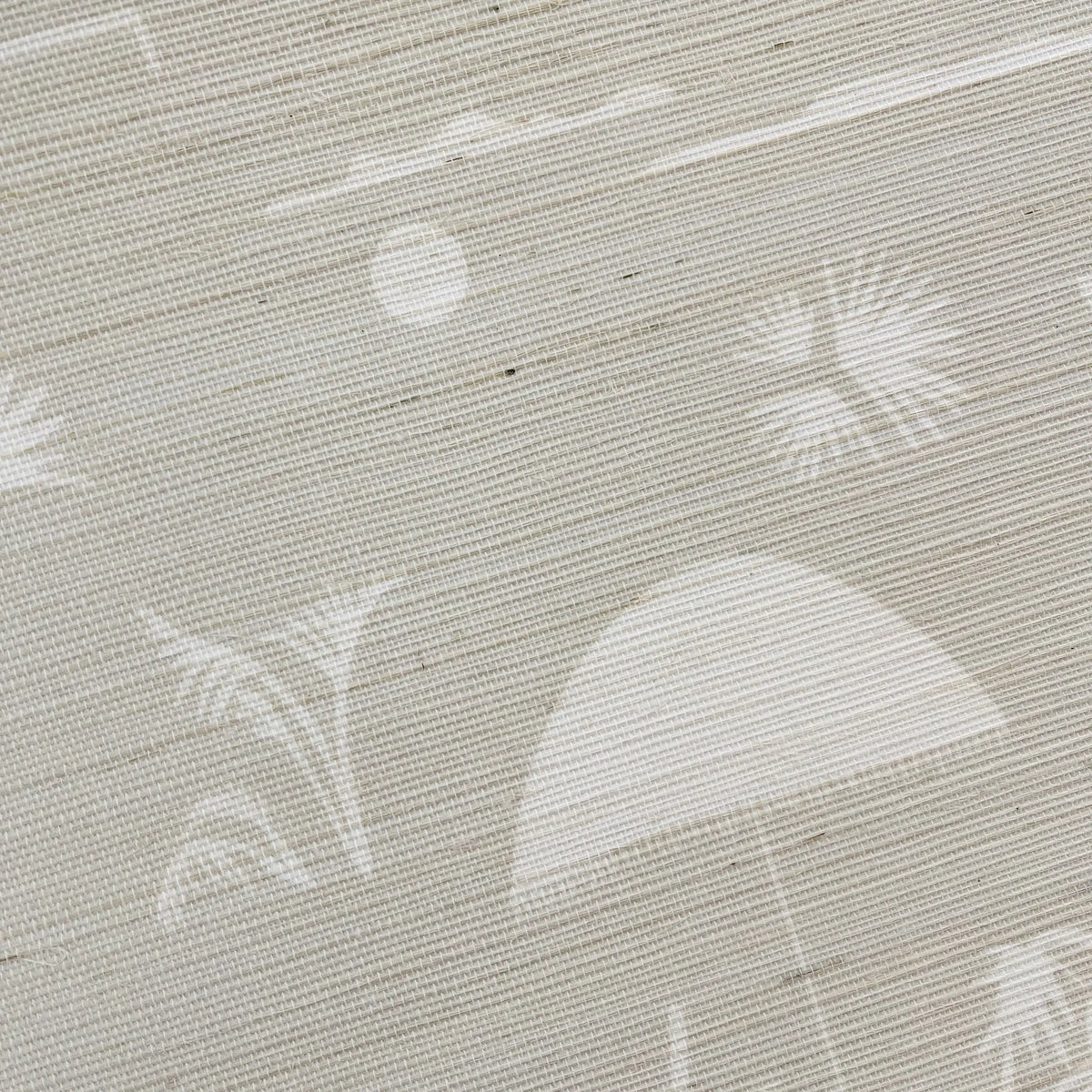 Folly Toile Grasscloth wallpaper in Sand – close-up showing texture and tone of design