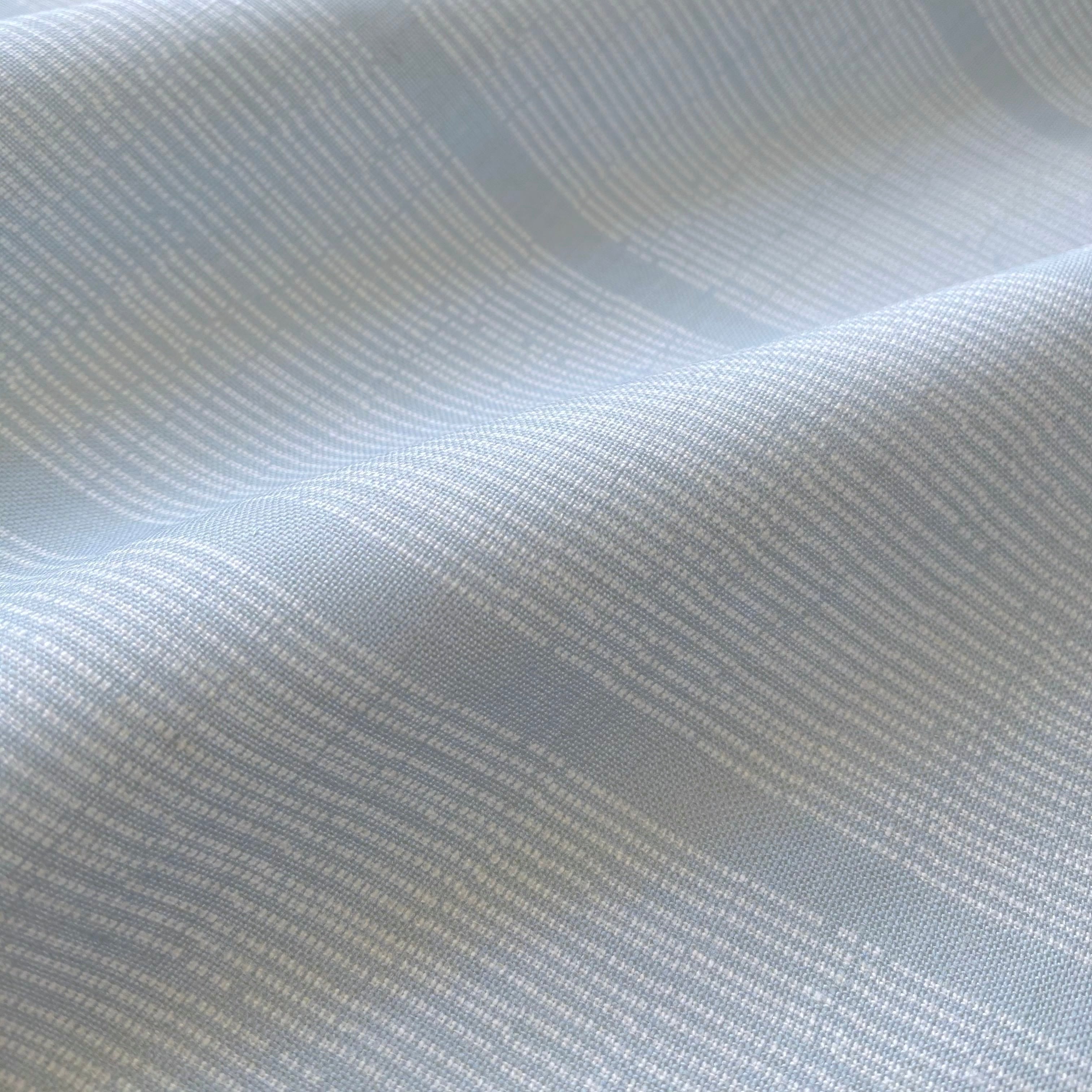 Close up of blue striped fabric for interior design by Charleston textile designer, Emily Daws.
