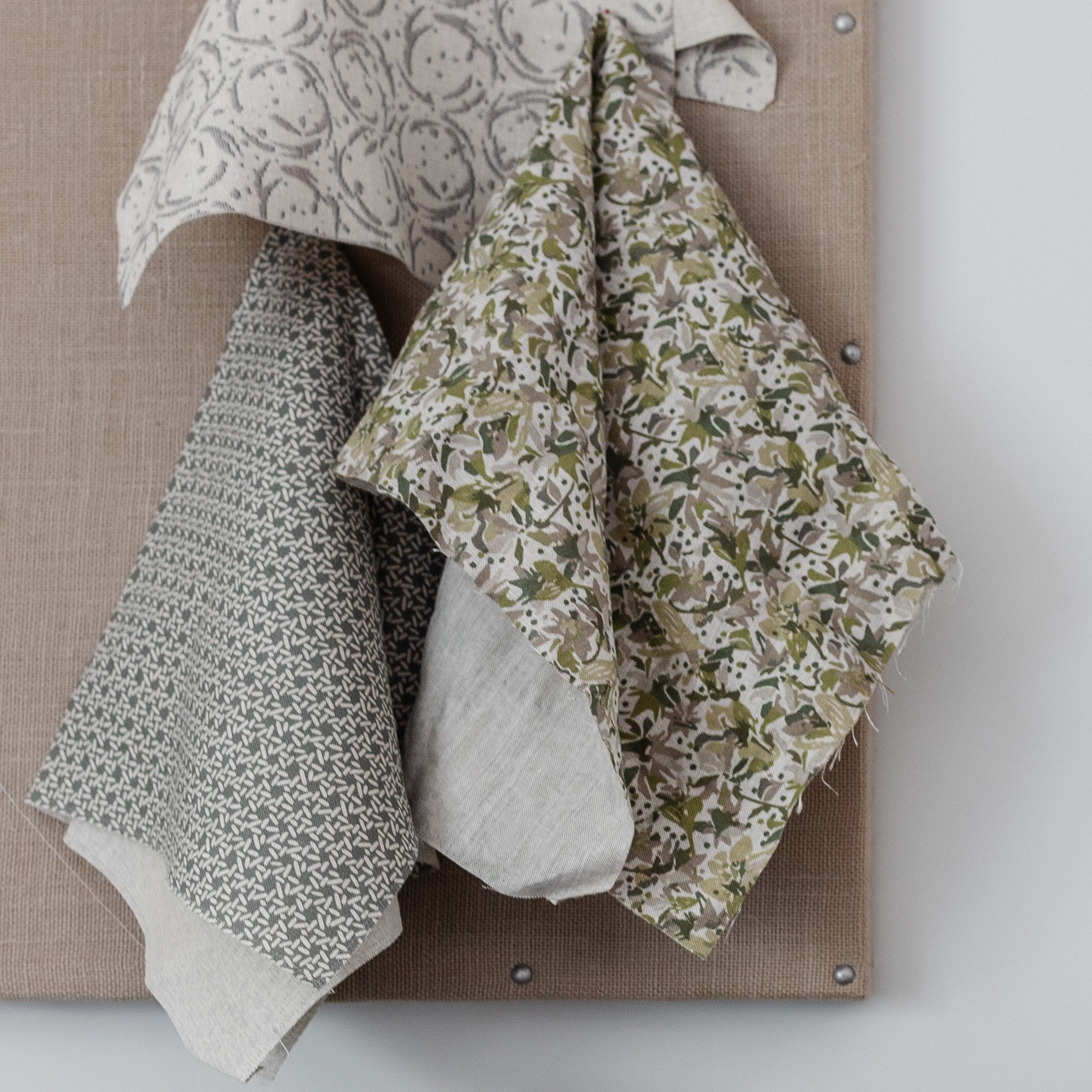 Carolina Rice fabric in Pine by Emily Daws styled in an interior — Charleston Collection