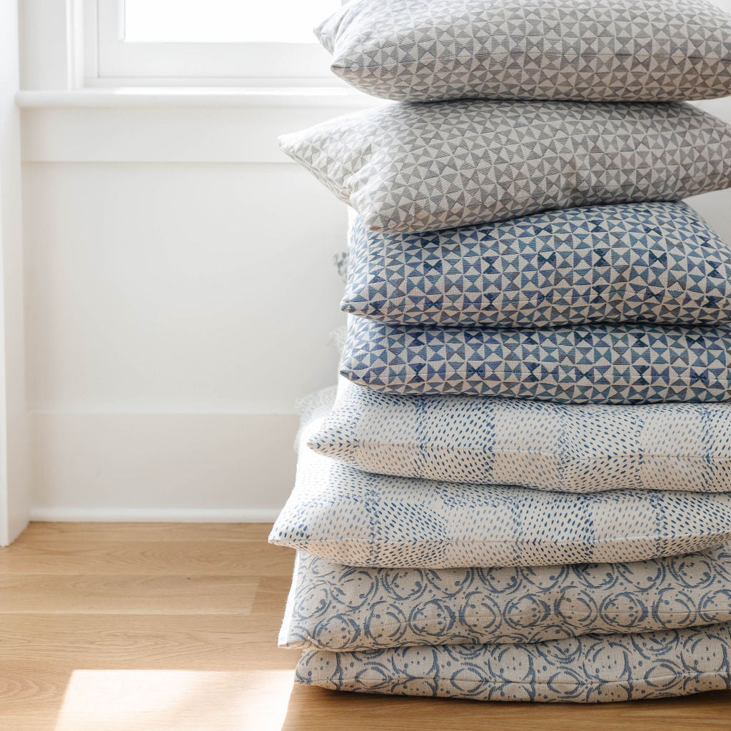 Decorative pillow grouping by Emily Daws featuring small-batch fabrics and Southern-inspired design details.