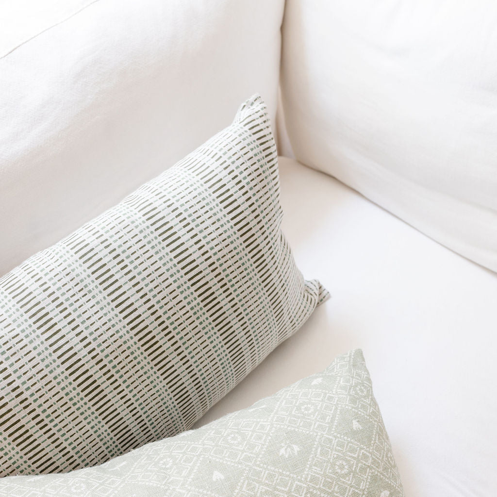 Emily Daws throw pillows, showcasing luxury textiles and heirloom-inspired patterns for designers.