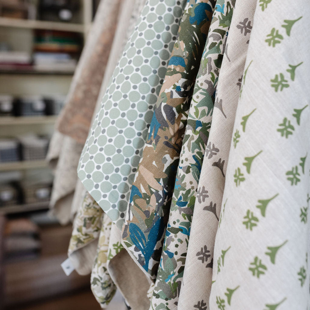 Emily Daws small-batch fabric for custom window treatments, pillows, and bespoke upholstery in boutique interiors.