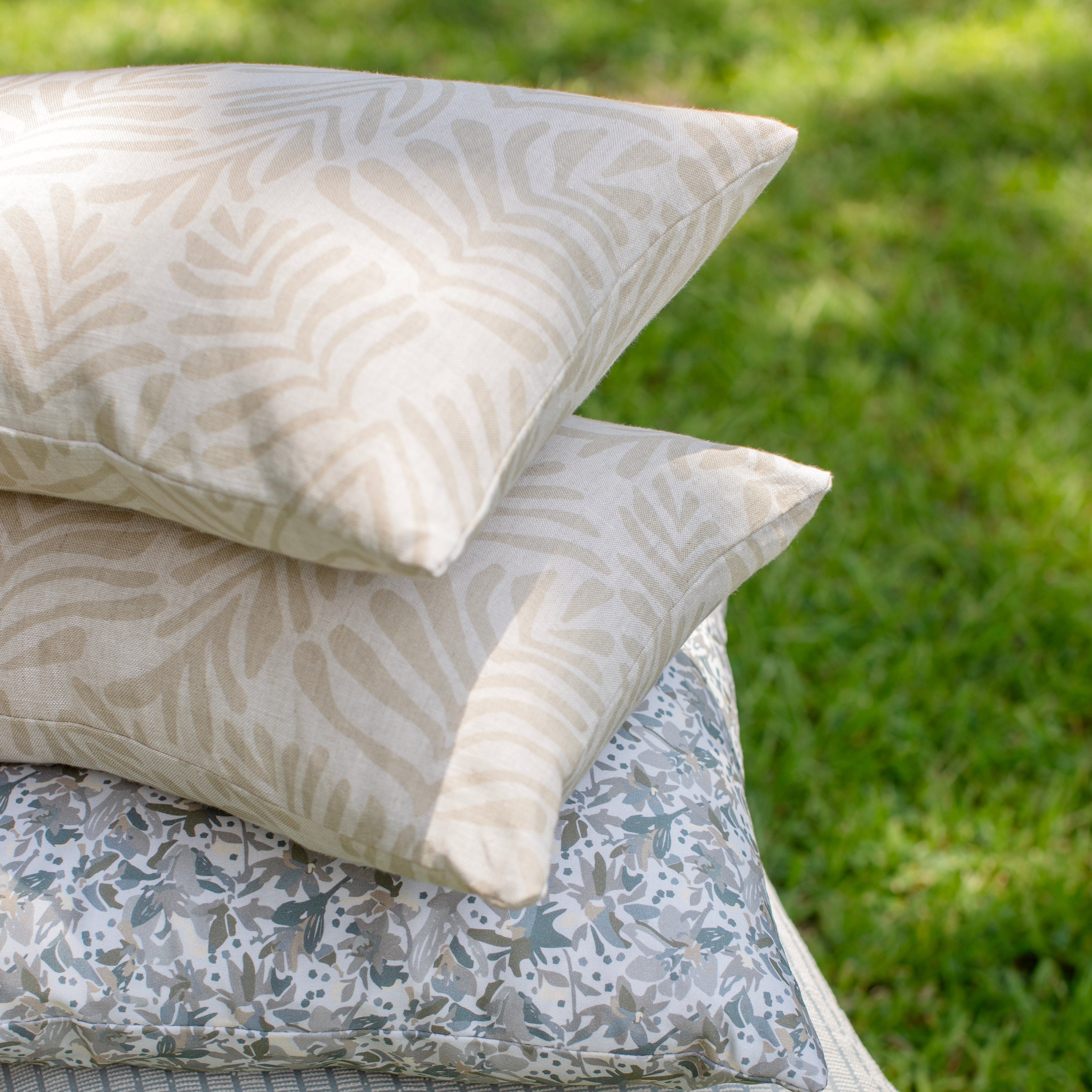 Decorative pillow grouping by Emily Daws featuring small-batch fabrics and Southern-inspired design details.
