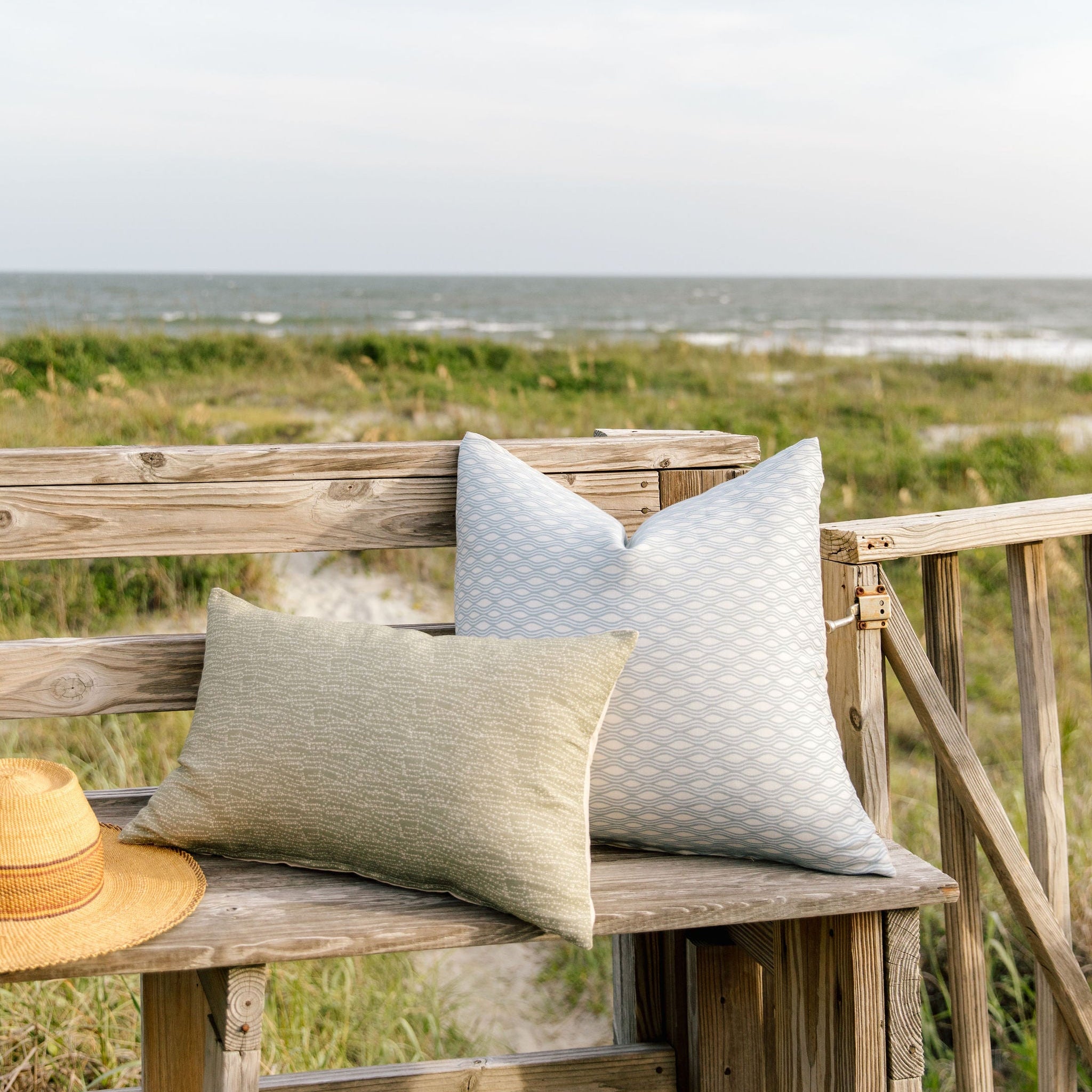 Bench seating styled with Emily Daws pillows in Belgian linen fabrics, created for trade professionals and clients.