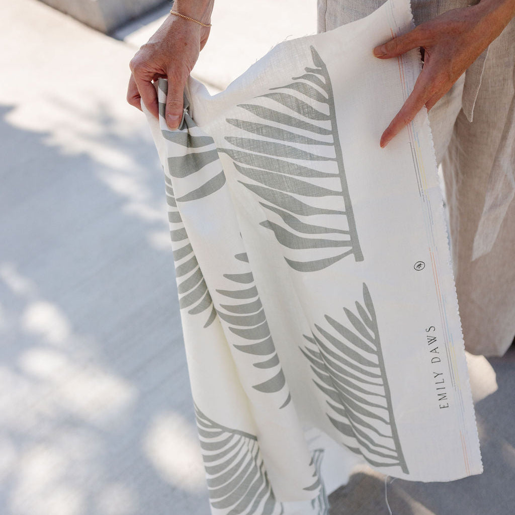 Emily Daws small-batch fabric for custom window treatments, pillows, and bespoke upholstery in boutique interiors.