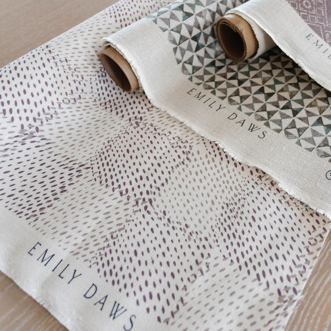 Emily Daws small-batch fabric for custom window treatments, pillows, and bespoke upholstery in boutique interiors.