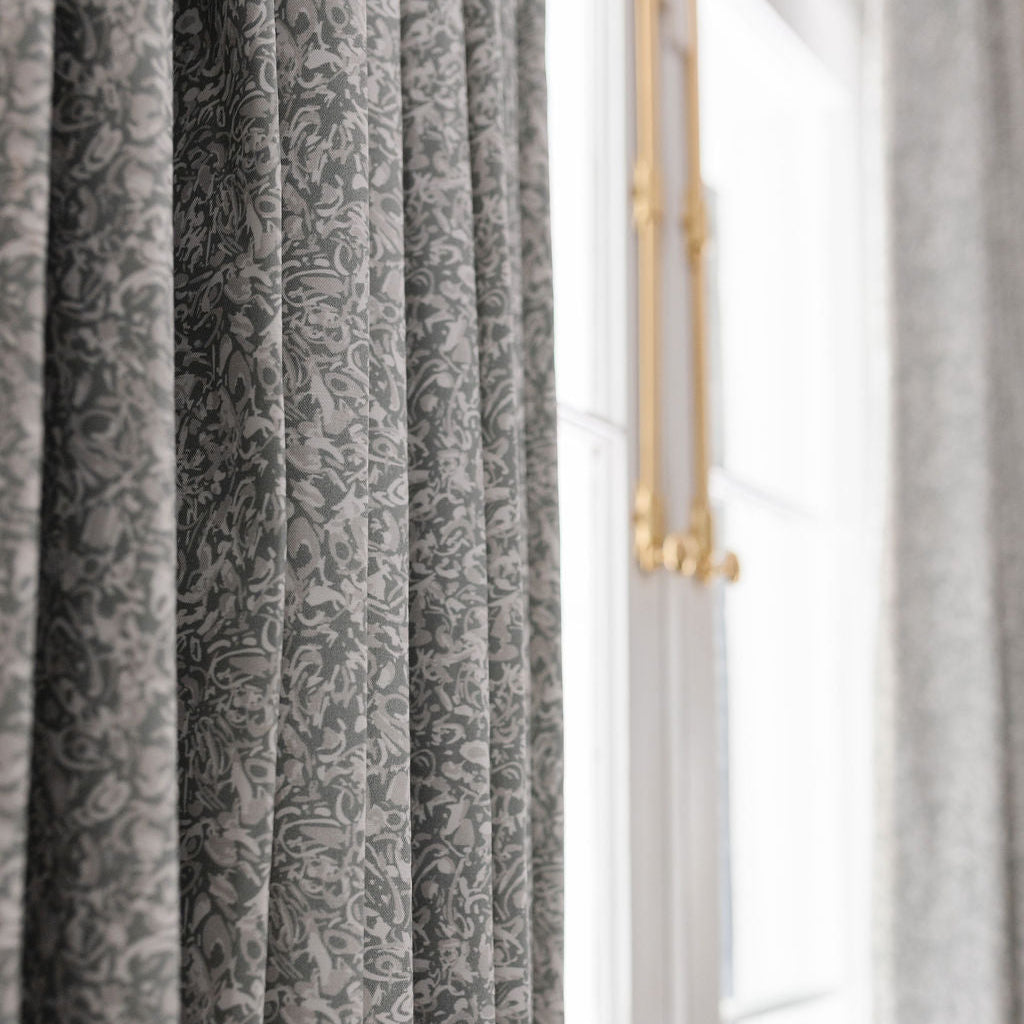 Custom drapery in Emily Daws fabric, styled on tall windows for interior designers seeking bespoke window treatments.
