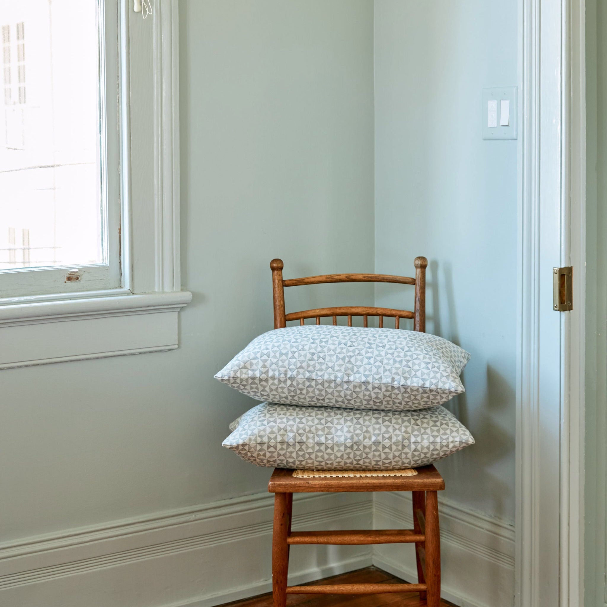 Kaleidoscope pillow in Cashmere styled by Emily Daws – paired with earthy tones in a mountain retreat