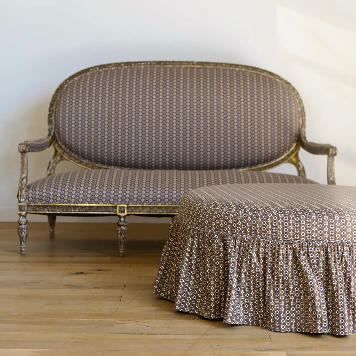 Antique upholstered chair and ottoman with Emily Daws Nectar Fabric in Walnut.