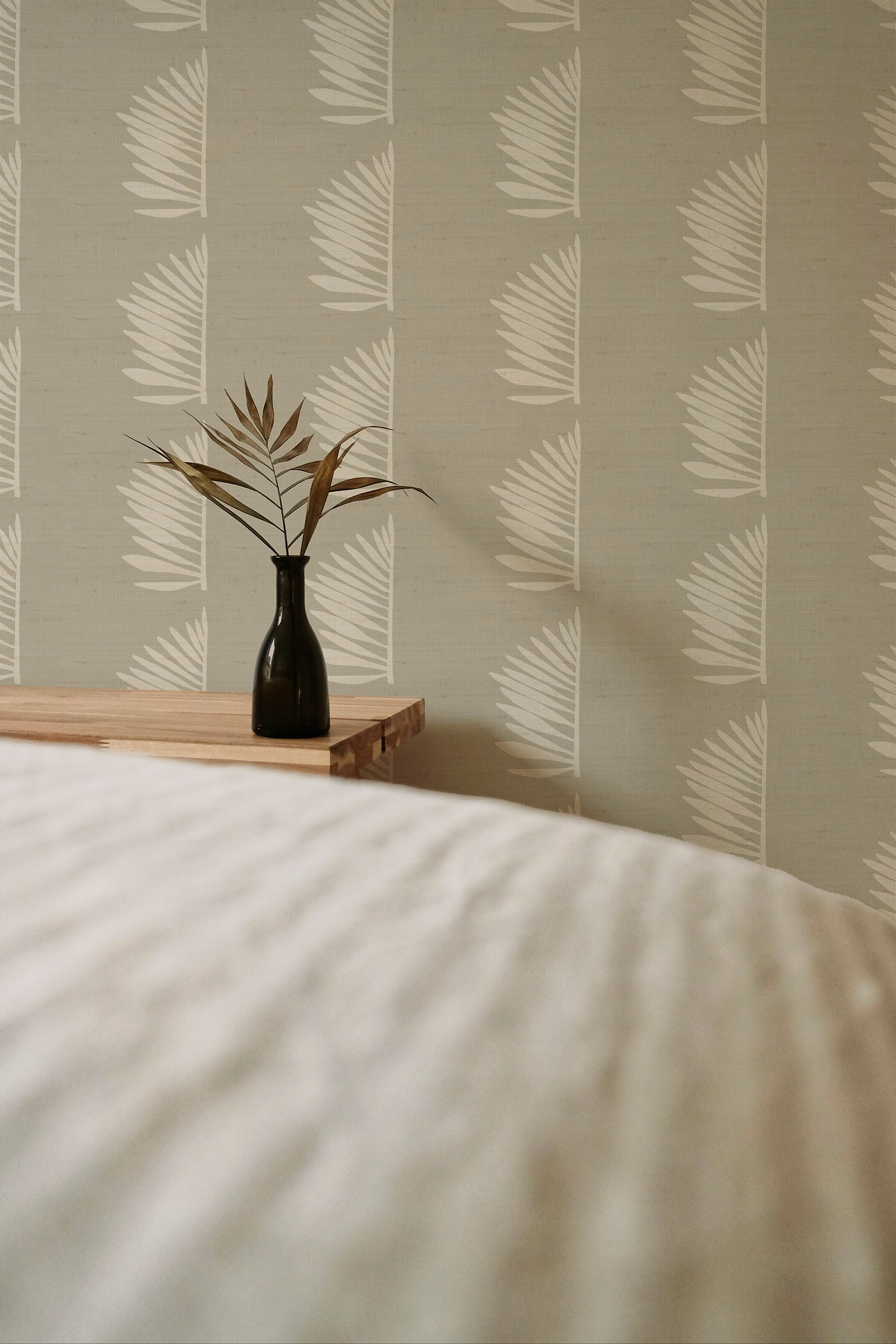 Palmetto Grasscloth wallpaper in Dune styled by Emily Daws – beach house bedroom with layered textures