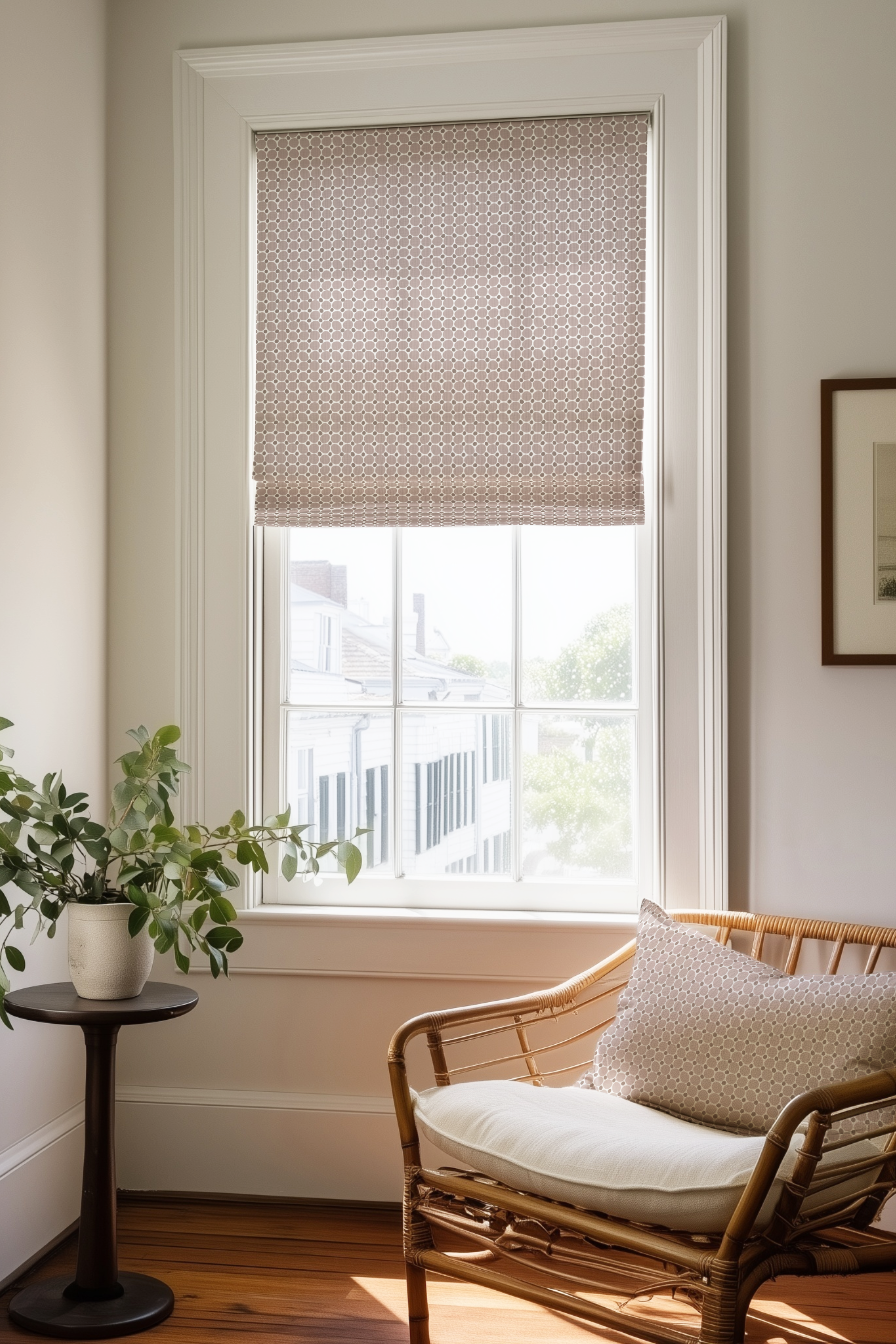 Corner of a bedroom in a Charleston home with a Roman shade and pillow in Cobblestone fabric in Terracotta by Emily Daws.