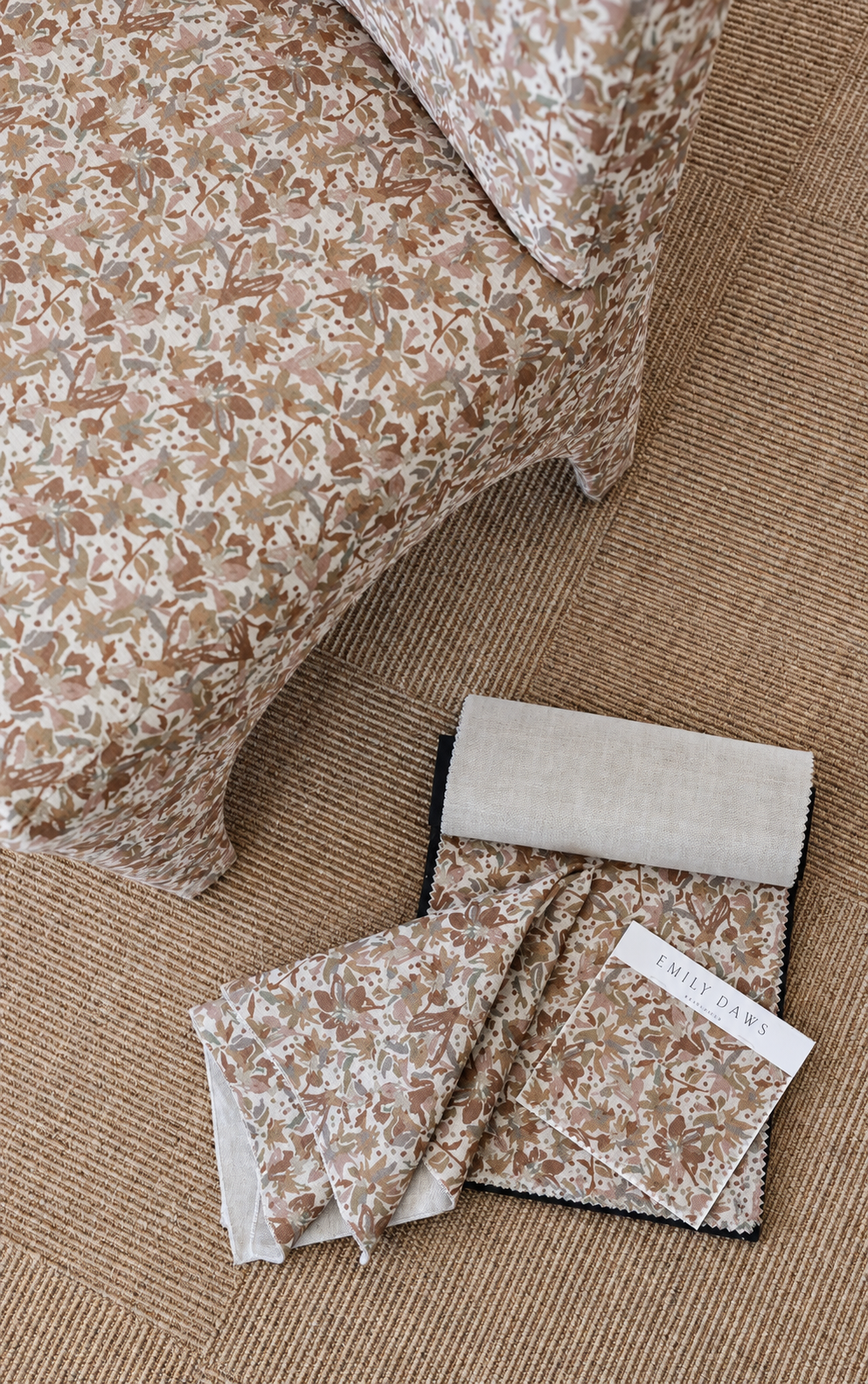Emily Daws Eden fabric on a chair and shown as fabric swatches in the showroom.