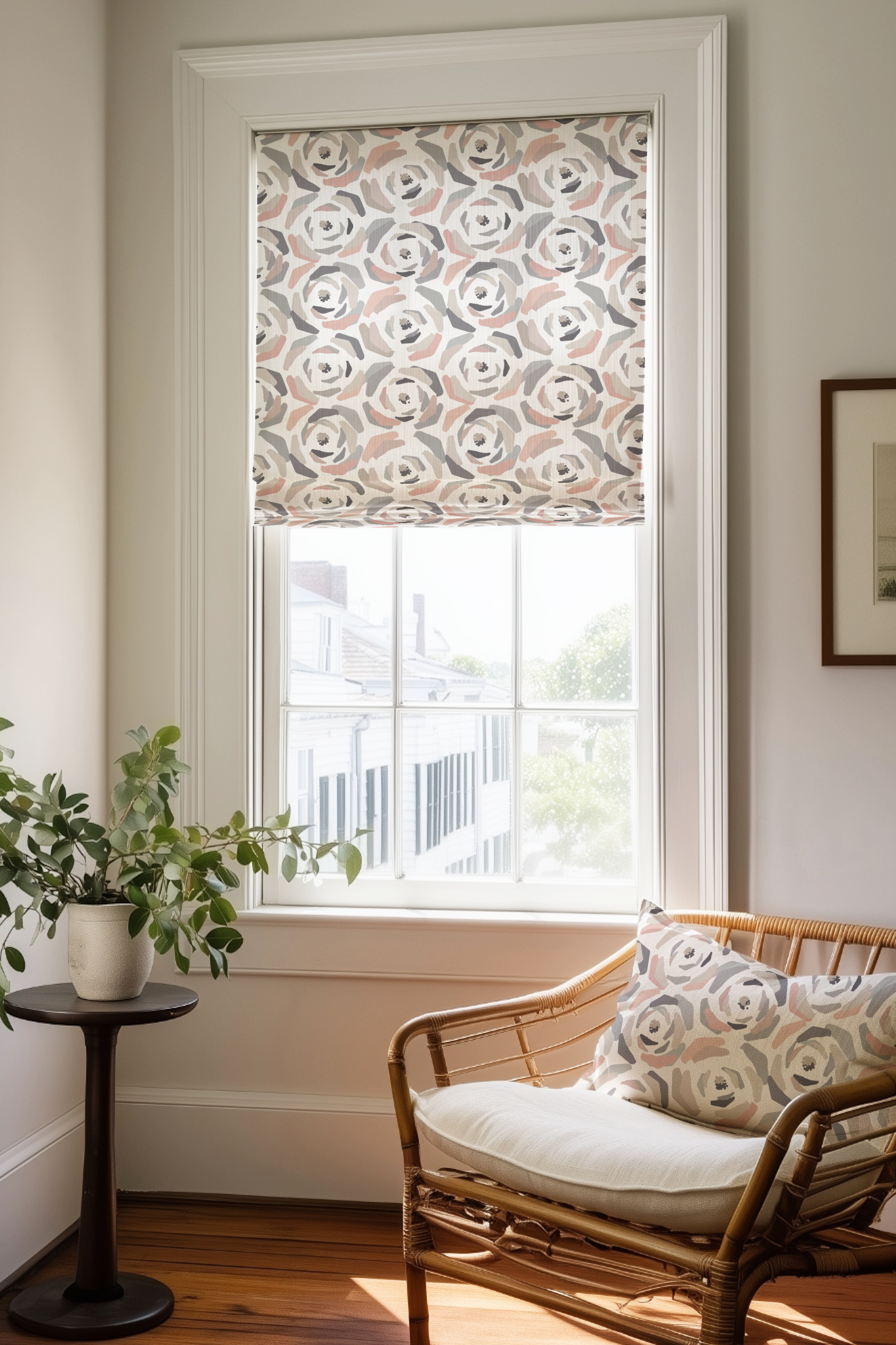 Corner of a bedroom in a Charleston home with a Roman shade and pillow in Magnolia fabric in Multi by Emily Daws.