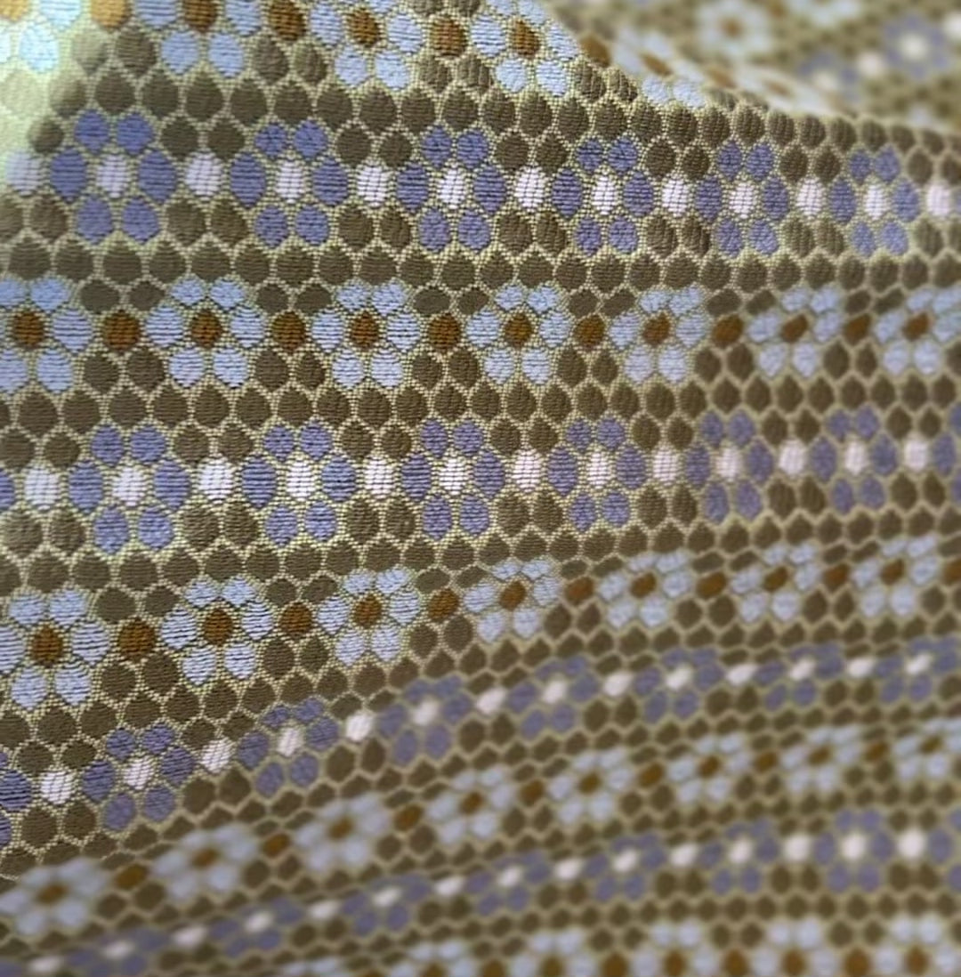 Small-batch fabric by Emily Daws created for interior designers seeking artisanal wallcoverings, pillows, and textiles.