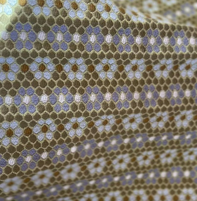 Small-batch fabric by Emily Daws created for interior designers seeking artisanal wallcoverings, pillows, and textiles.