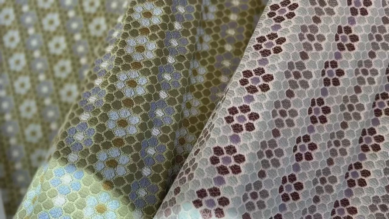 Woven performance fabric by Emily Daws shifting in the sunlight.