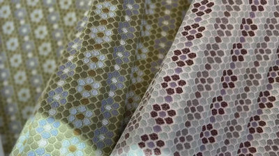 Woven performance fabric by Emily Daws shifting in the sunlight.