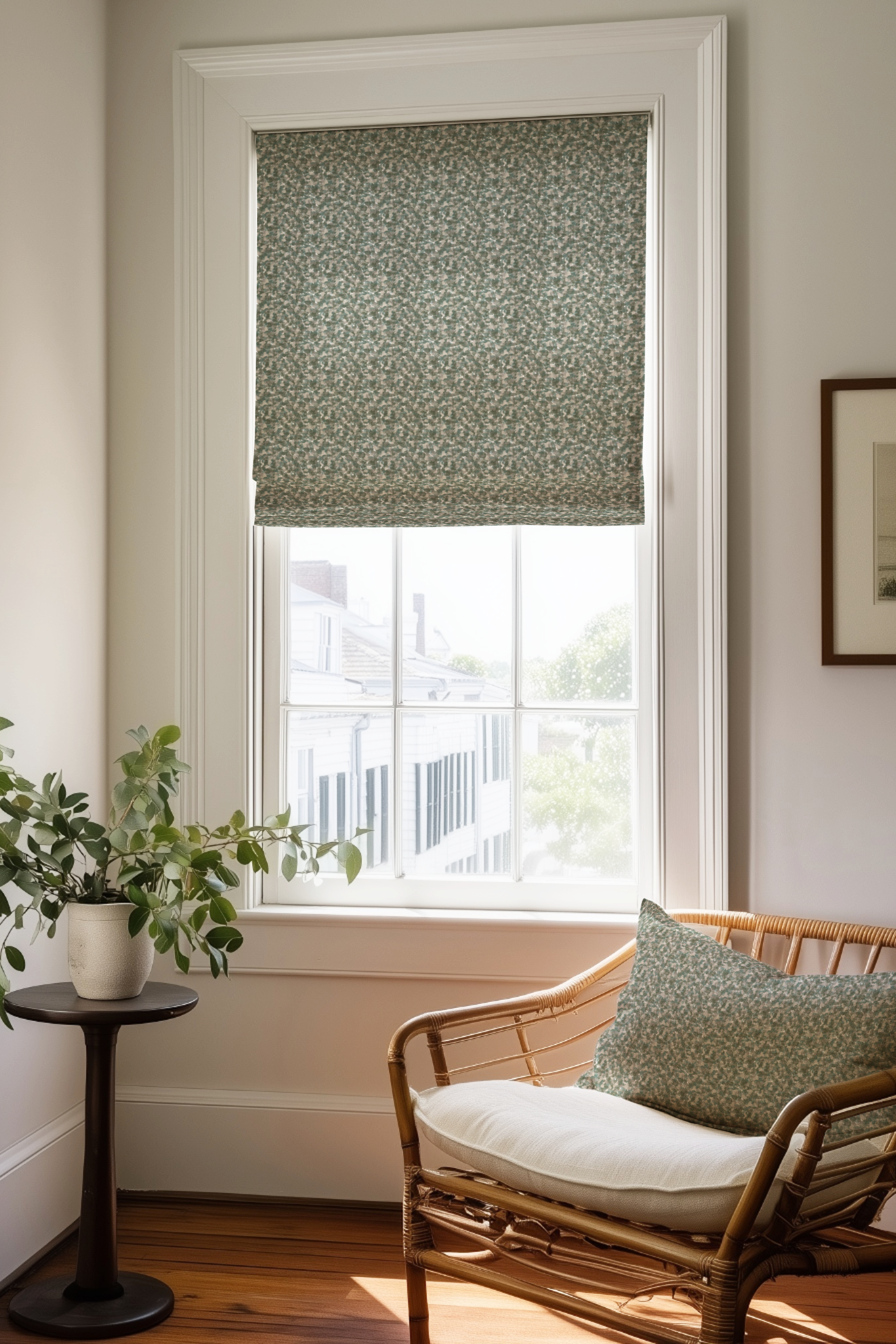 Corner of a bedroom in a Charleston home with a Roman shade and pillow in Tortoise fabric in Fig by Emily Daws.