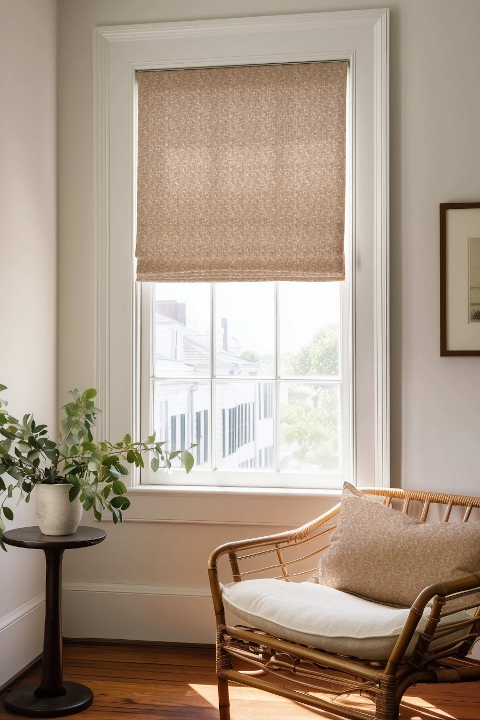 Corner of a bedroom in a Charleston home with a Roman shade and pillow in Tortoise fabric in Taffy by Emily Daws.
