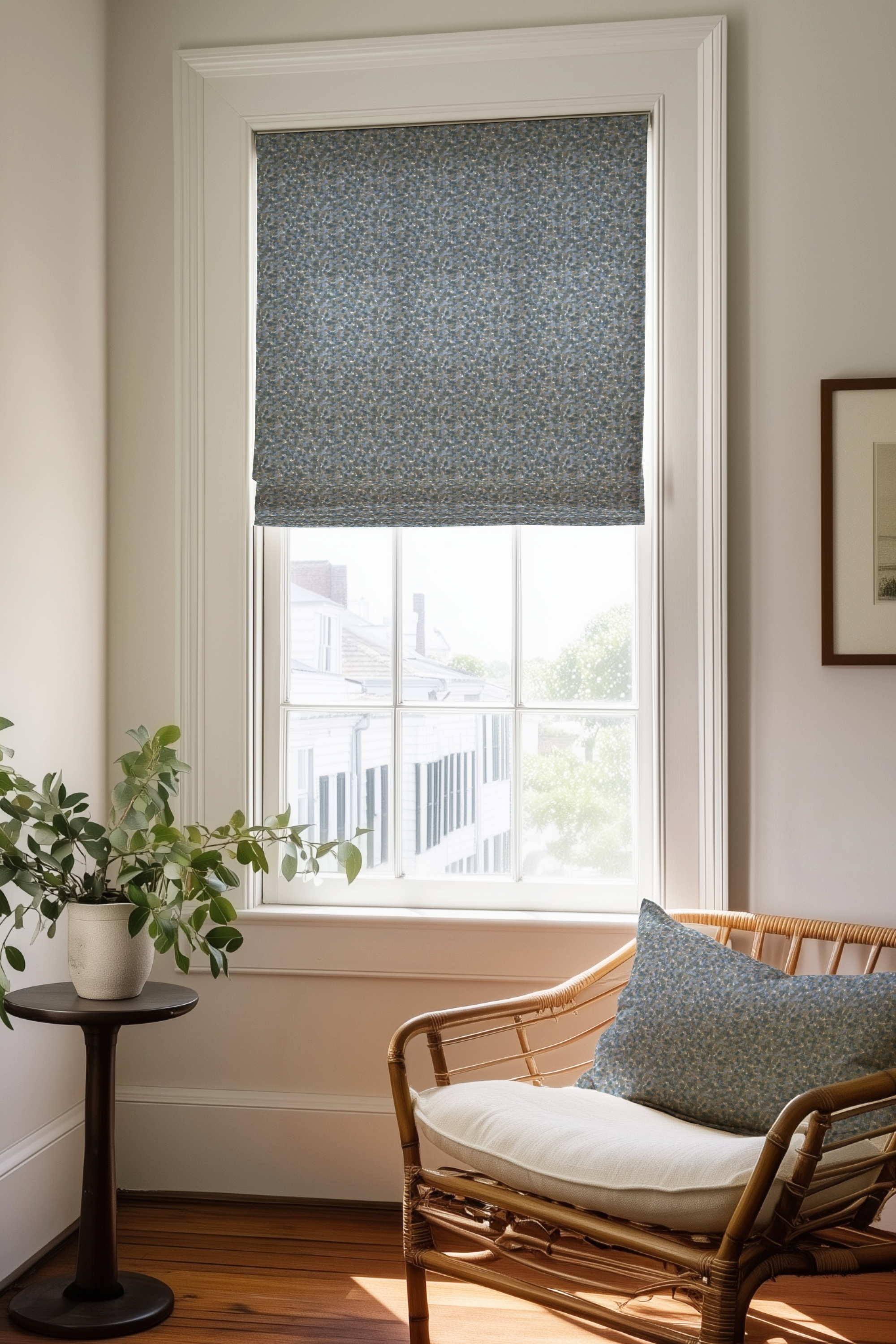 Corner of a bedroom in a Charleston home with a Roman shade and pillow in Tortoise fabric in Thistle by Emily Daws.